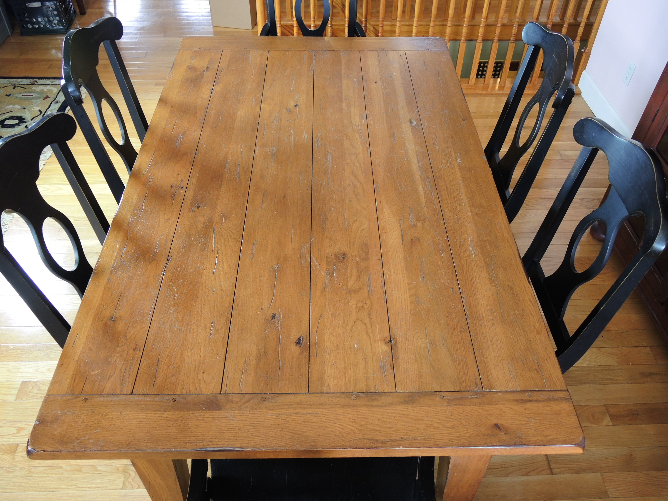 Broyhill "Attic Heirlooms" Rustic Oak Planked Table and Six Ebonized Chairs