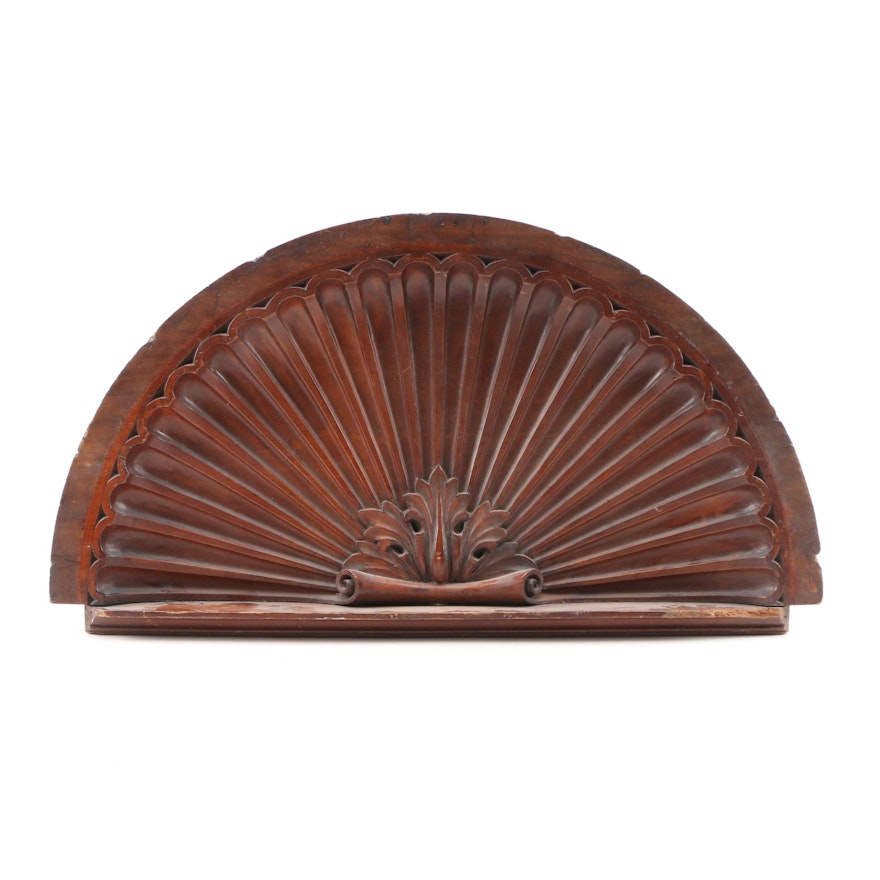 Stained Walnut Architectural Shell-form Over Door Panel