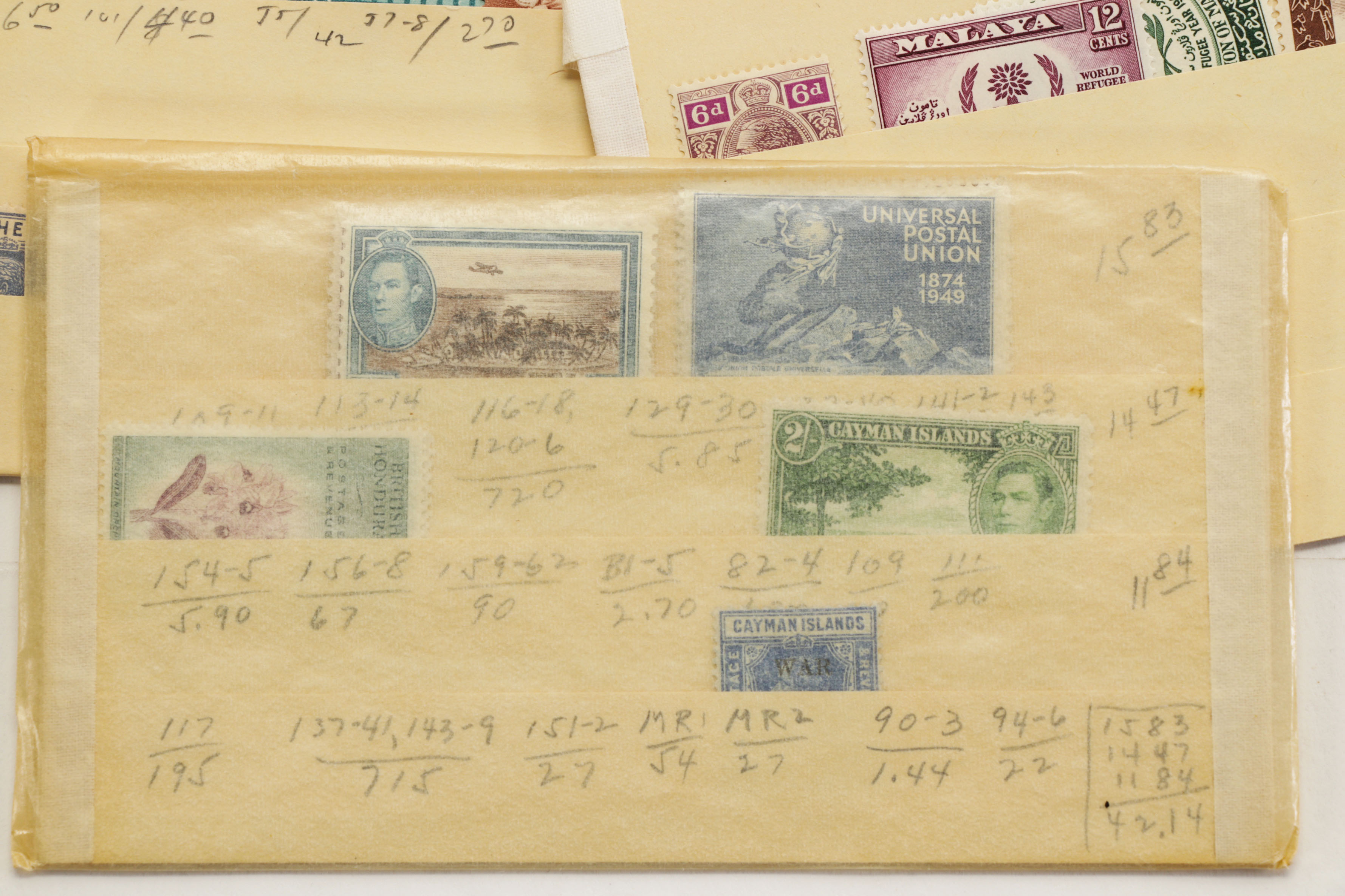 Hundreds of Vintage U.S. and Foreign Postage Stamps