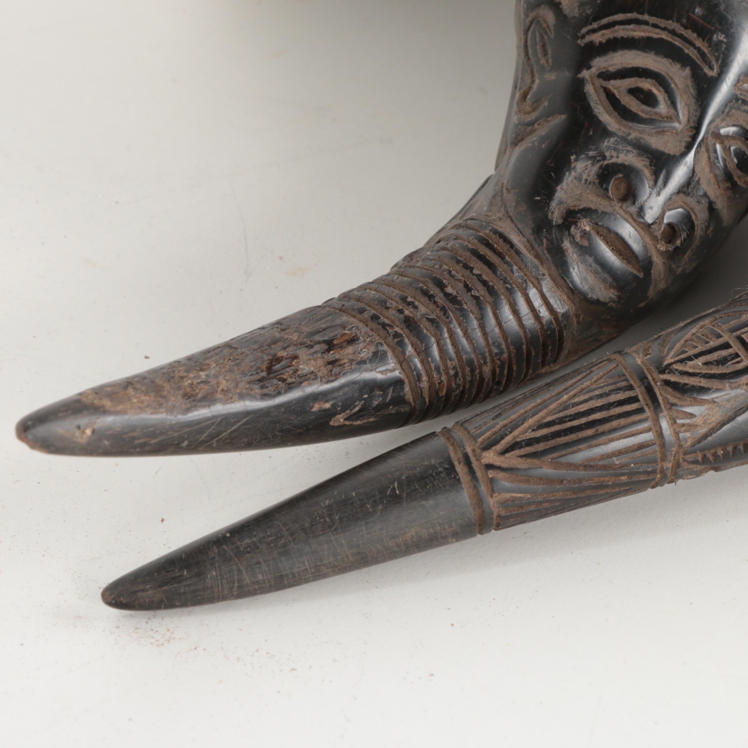 West African Carved Water Buffalo Horns with Figure and Crocodile Motifs