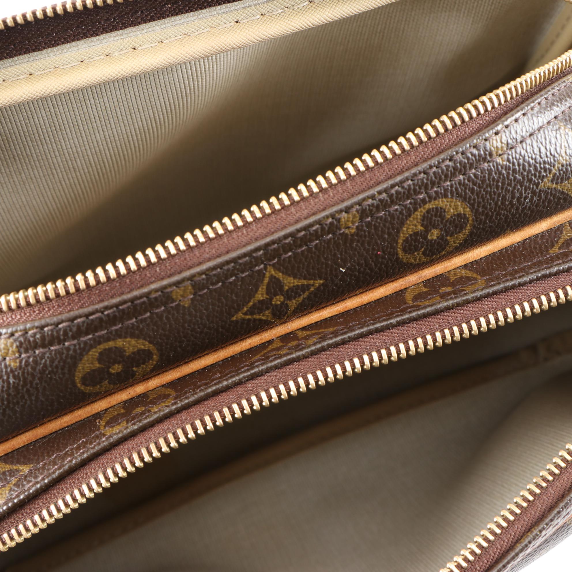 Louis Vuitton Reporter PM Bag in Monogram Canvas and Vachetta Leather