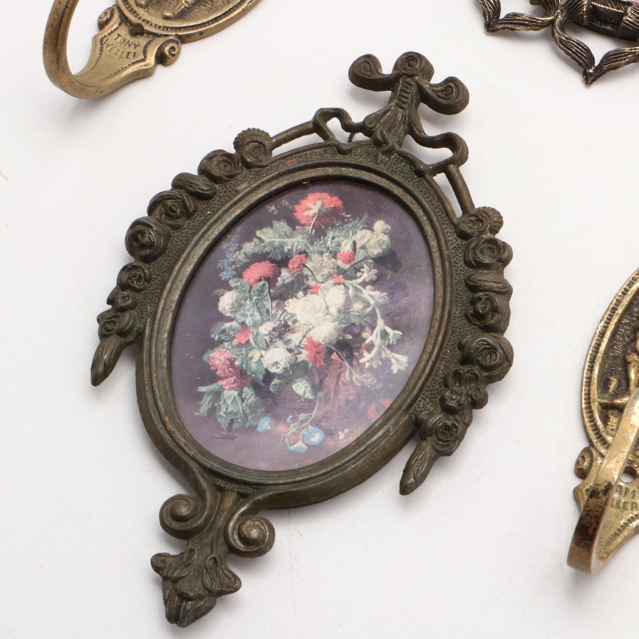 Brass and Metal Decor Including Wall Hooks and Picture Frames