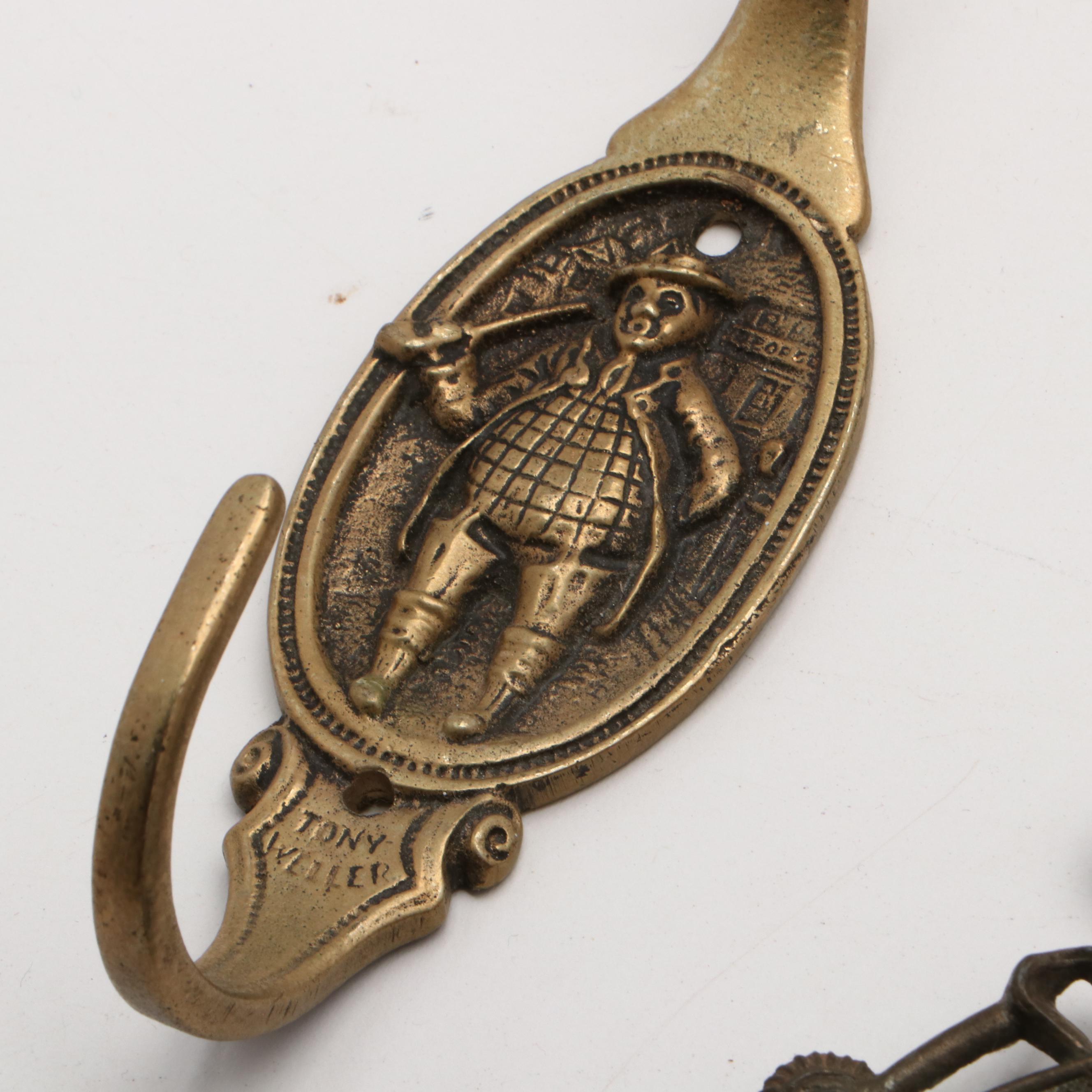 Brass and Metal Decor Including Wall Hooks and Picture Frames