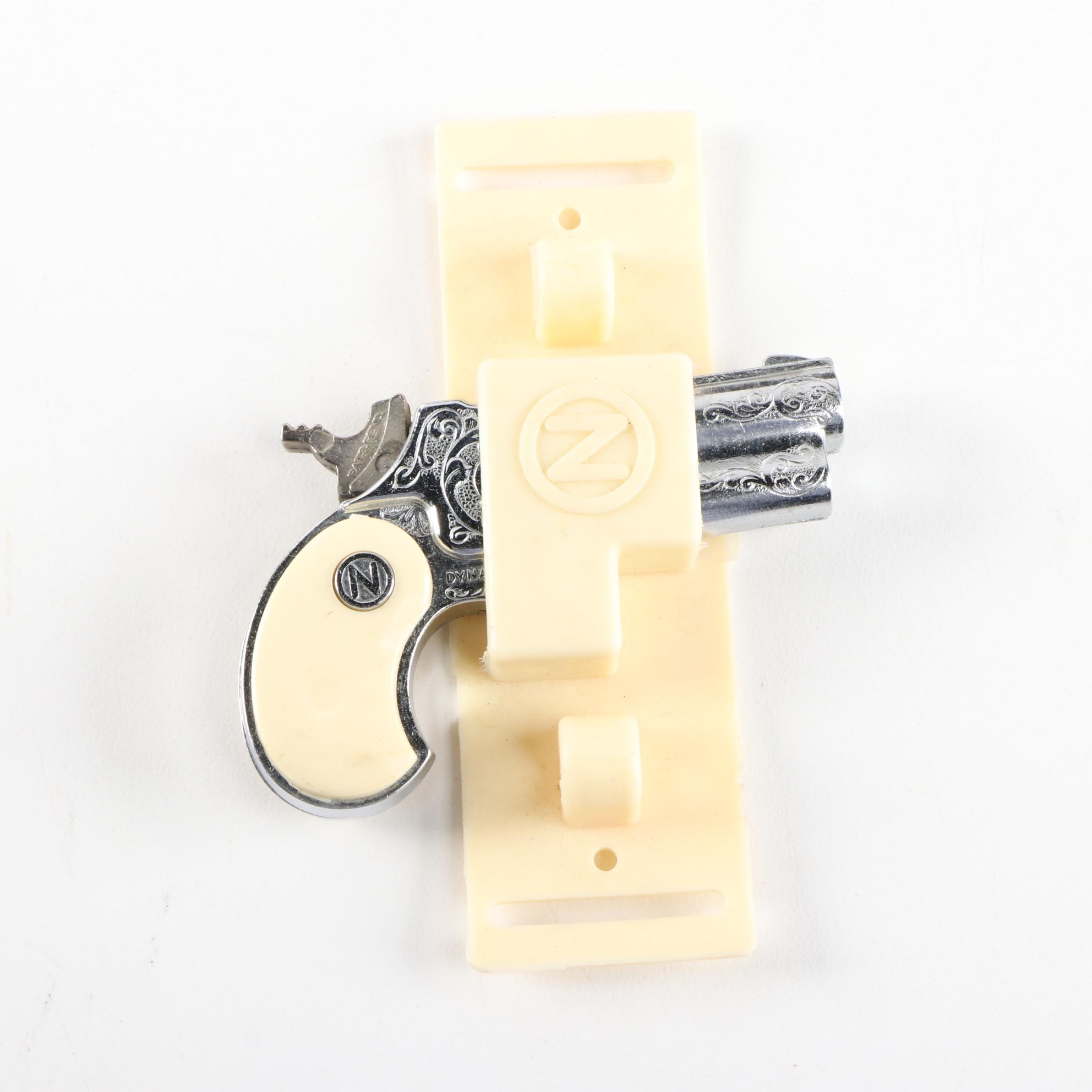 Marx Tiger Trike Wind-Up Toy, Mail Box Bank, Cap Guns, and Scout Flashlight