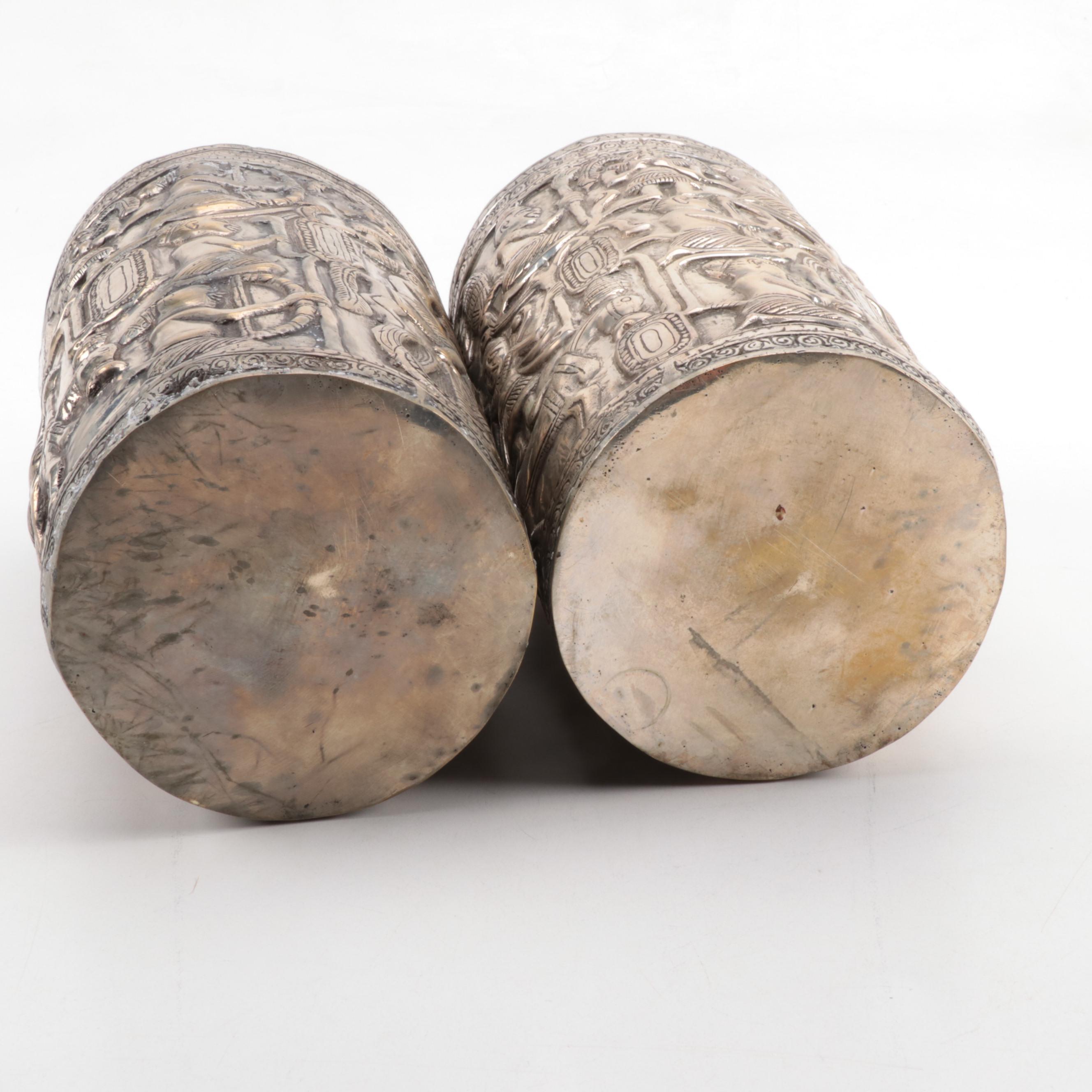 Pair of Southeast Asian Repoussé Silver Plate Vases