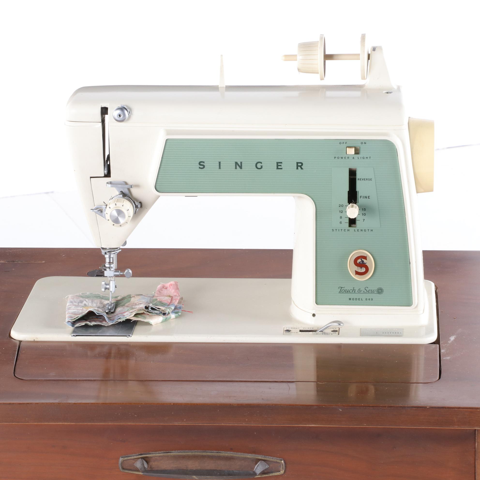Singer Touch and Sew Sewing Machine and Walnut Sewing Cabinet, circa 1969