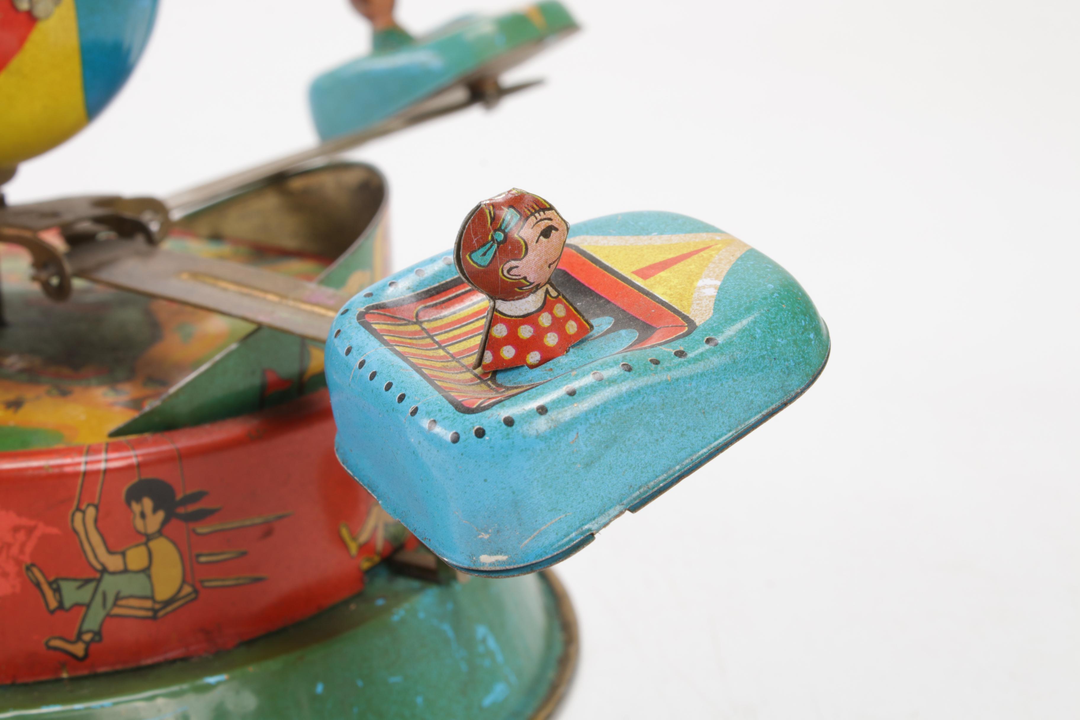 Tin Litho Amusement Park Carnival Ride Wind-Up Toy, 1950s