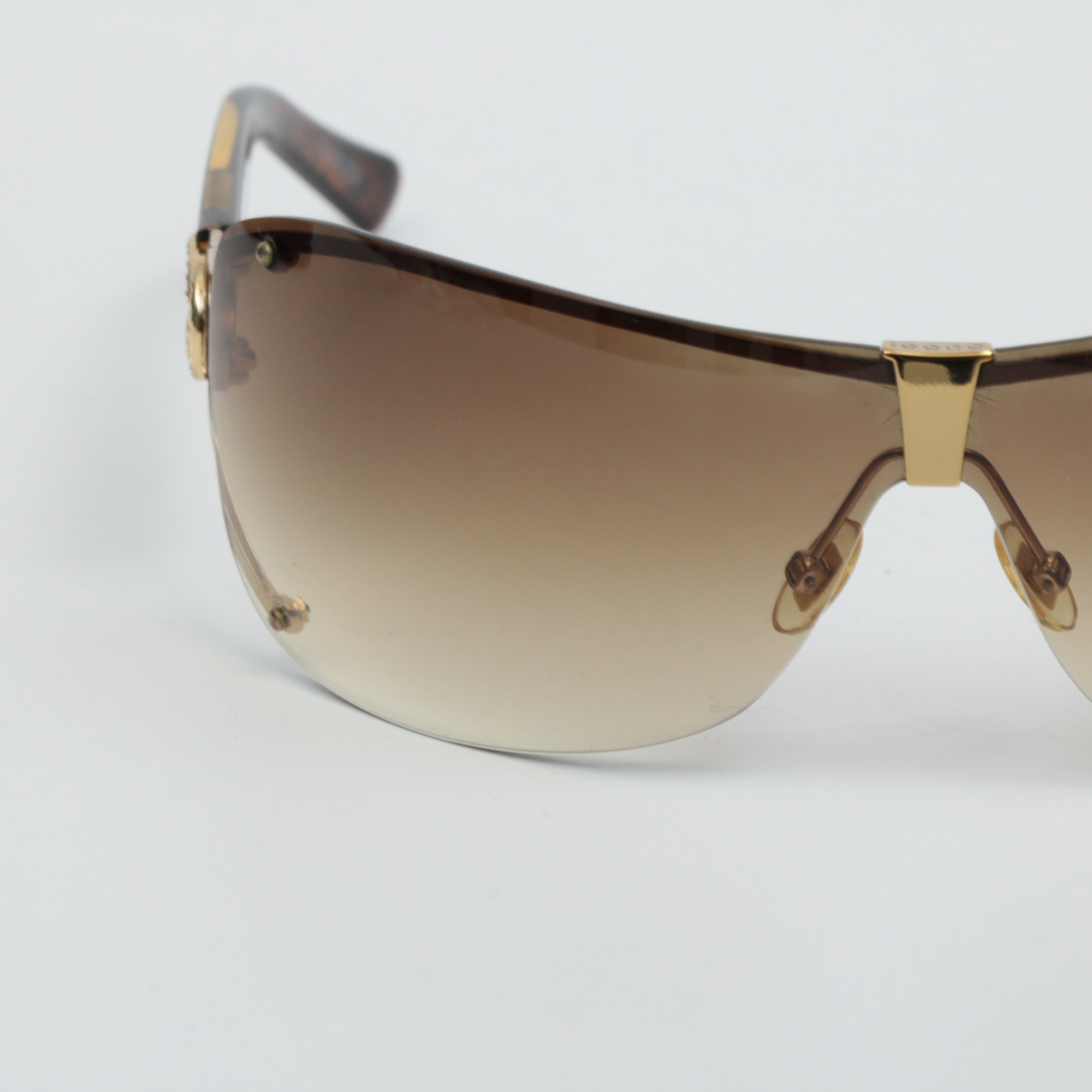 Gucci GG 2807/S Rimless Wrap Sunglasses with Rhinestone Logo Temples