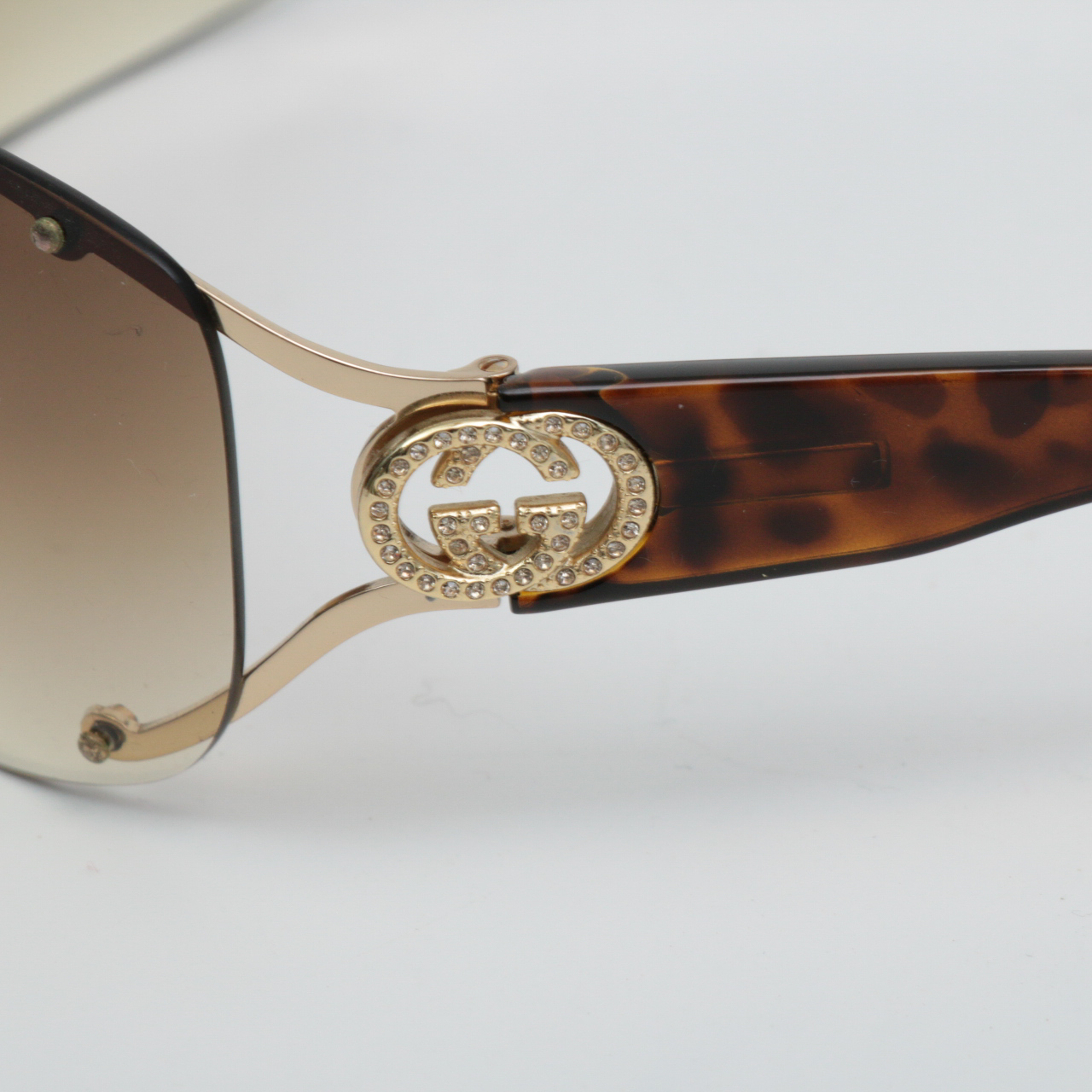 Gucci GG 2807/S Rimless Wrap Sunglasses with Rhinestone Logo Temples