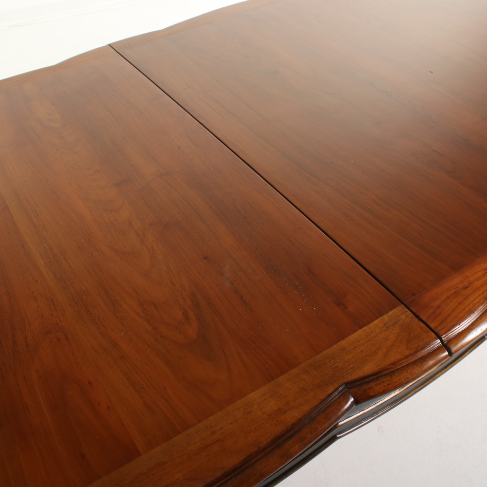 Roche Bobois "Volutes" Parcel-Gilt, Parcel-Ebonized, and Cherrywood Dining Table