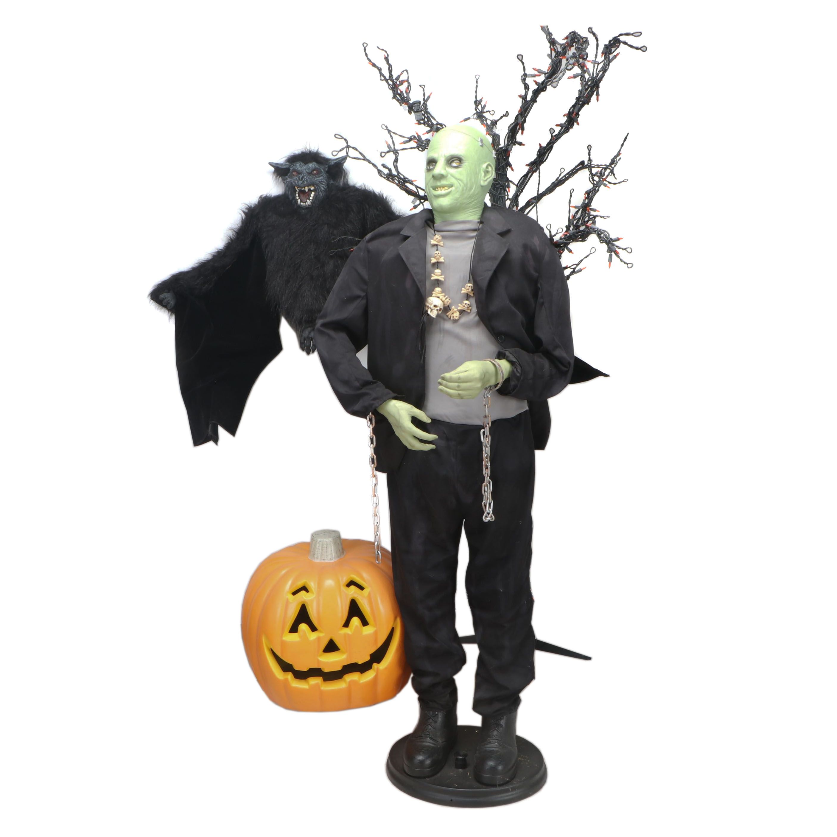 Halloween Décor Including Life-Size Zombie, Large Bat, and Illuminated Tree