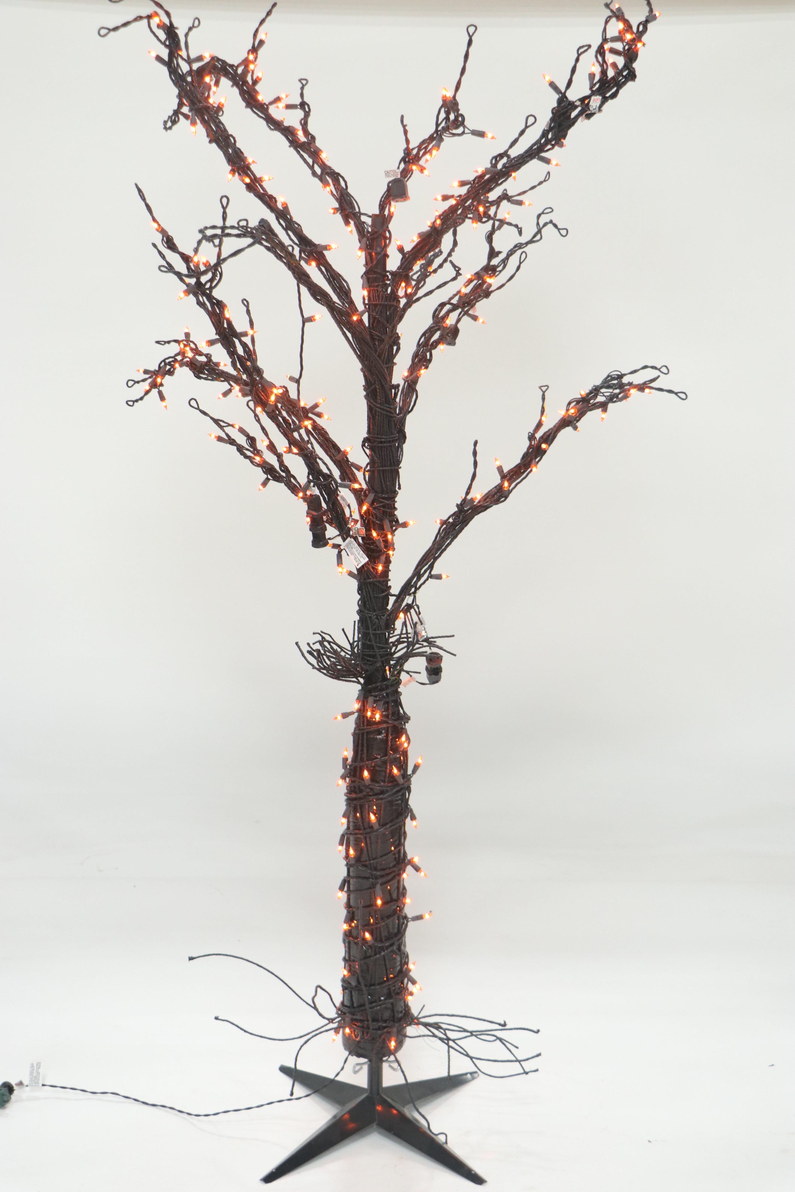 Halloween Décor Including Life-Size Zombie, Large Bat, and Illuminated Tree