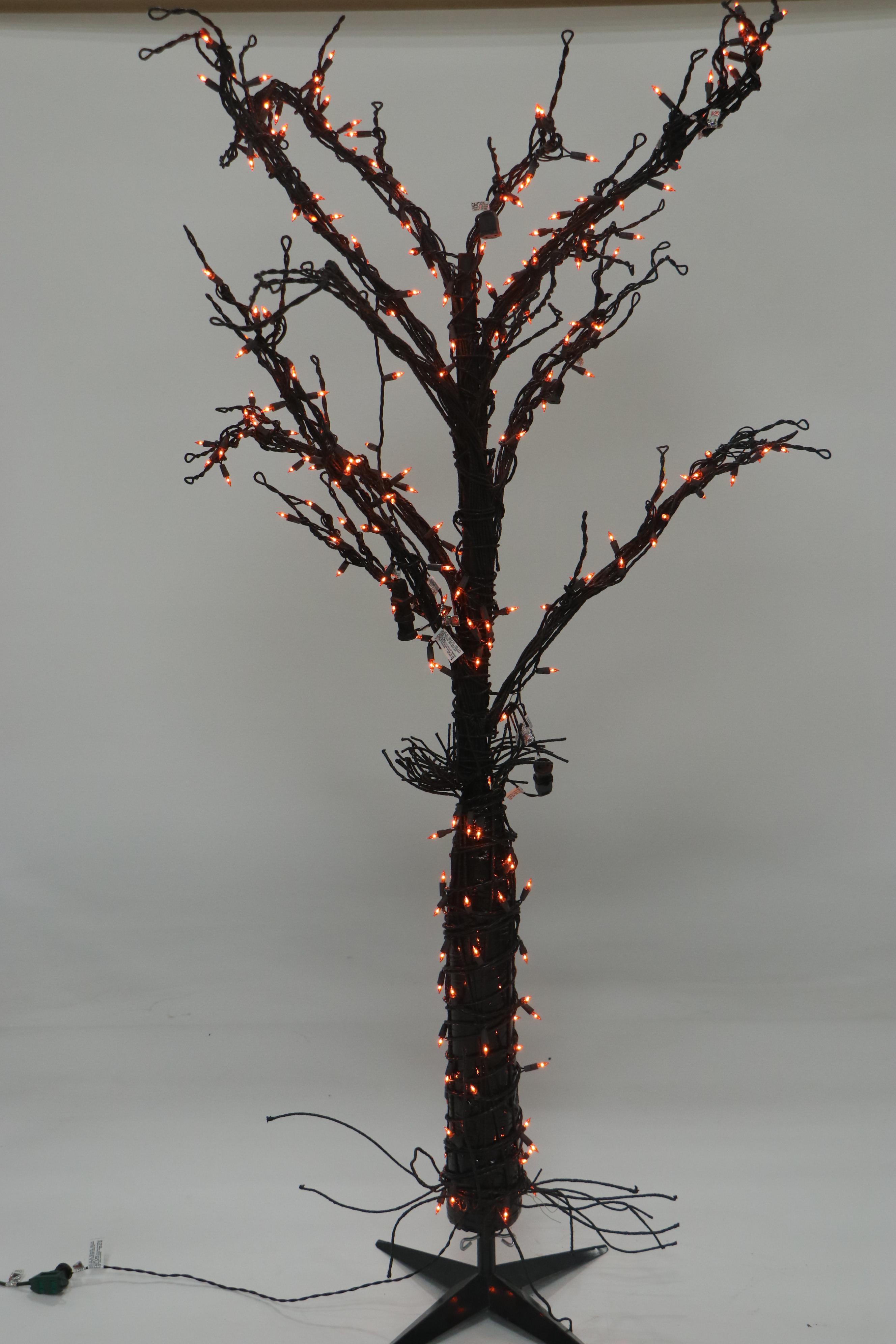 Halloween Décor Including Life-Size Zombie, Large Bat, and Illuminated Tree