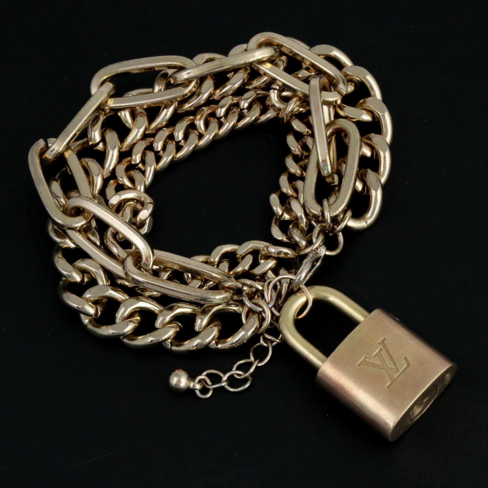 Louis Vuitton Brass Lock on Gold Tone Multistrand Bracelet