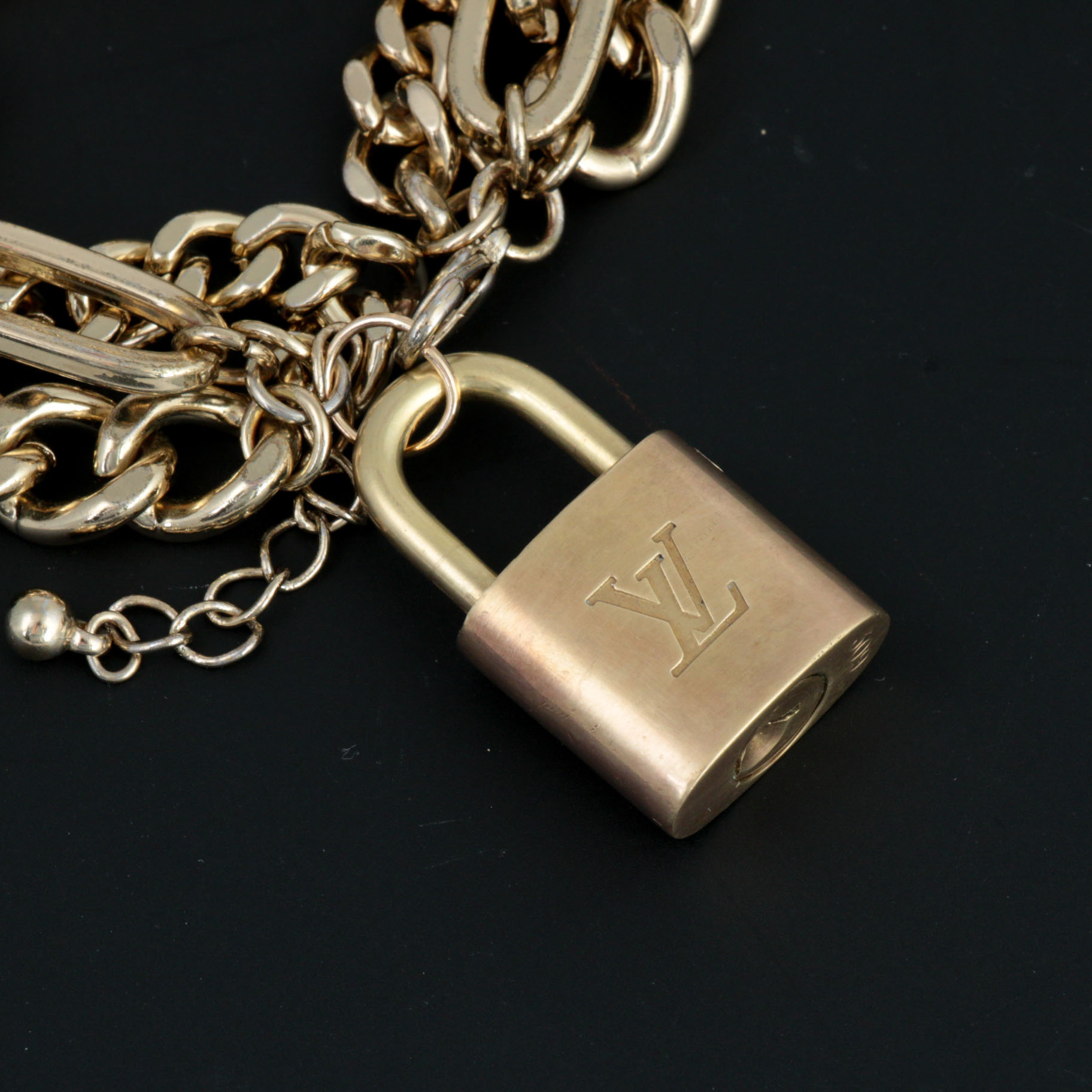 Louis Vuitton Brass Lock on Gold Tone Multistrand Bracelet
