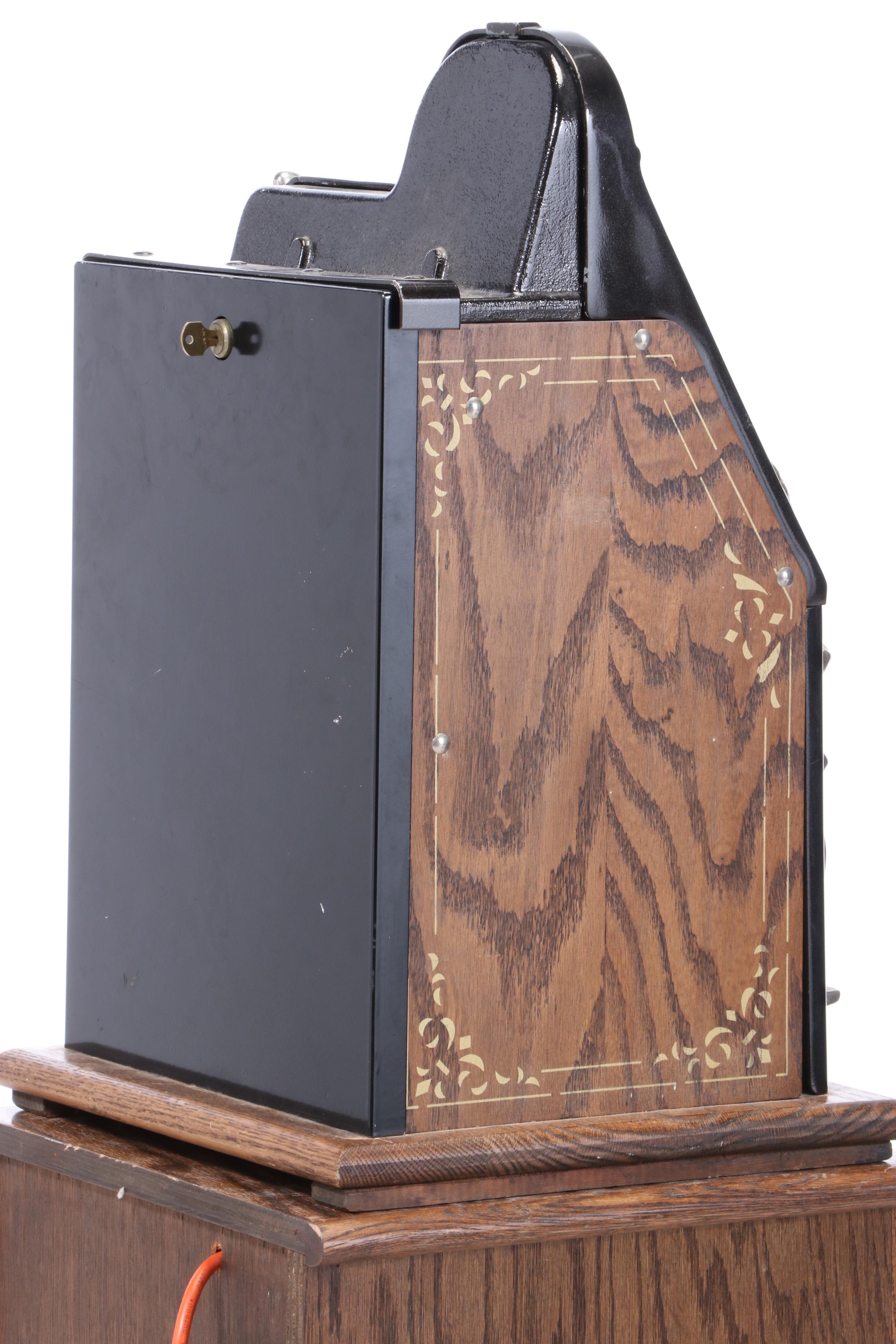 Mills "Golden Nugget" 25 Cent Coin-Operated Slot Machine and Cabinet, Mid-20th C