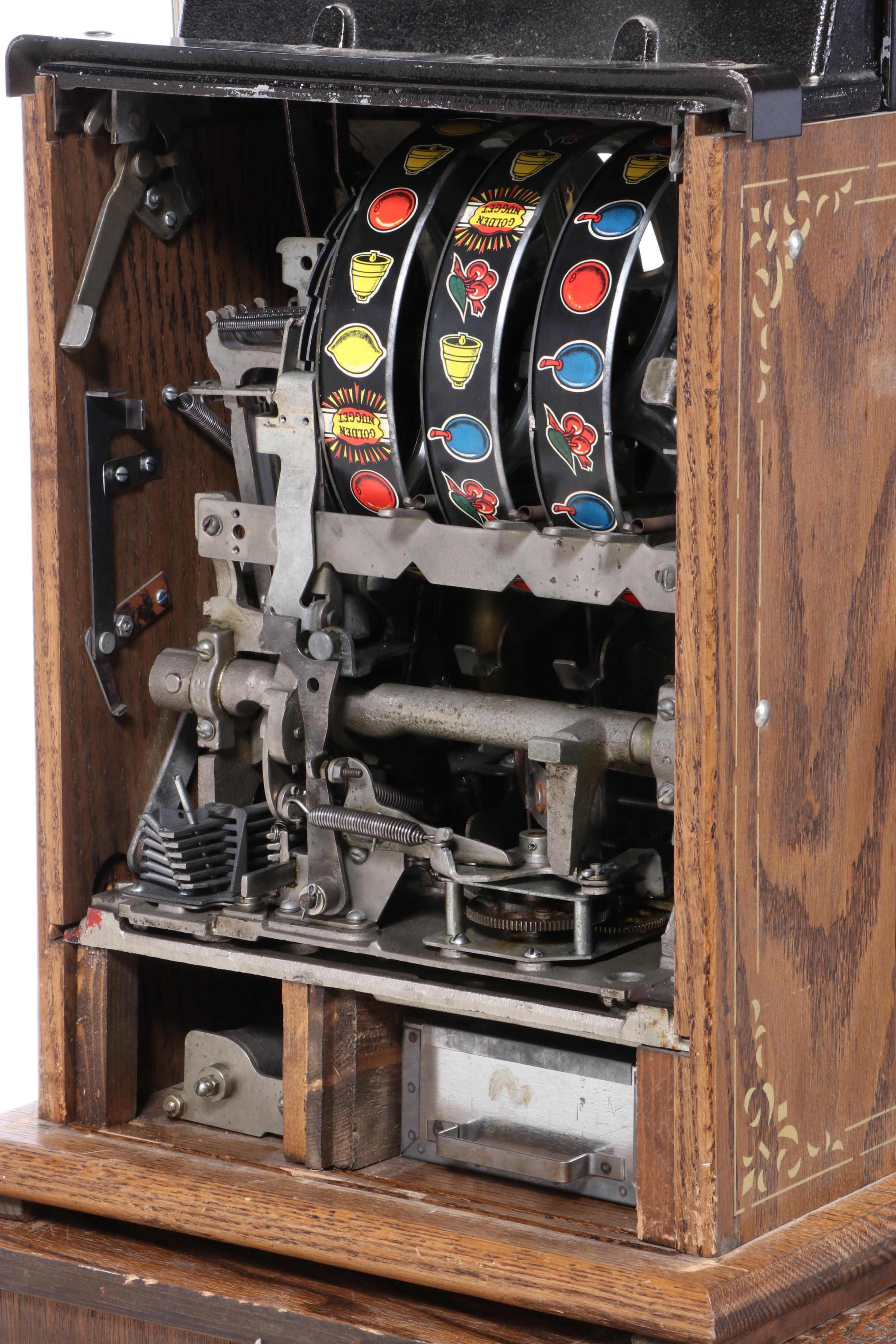 Mills "Golden Nugget" 25 Cent Coin-Operated Slot Machine and Cabinet, Mid-20th C
