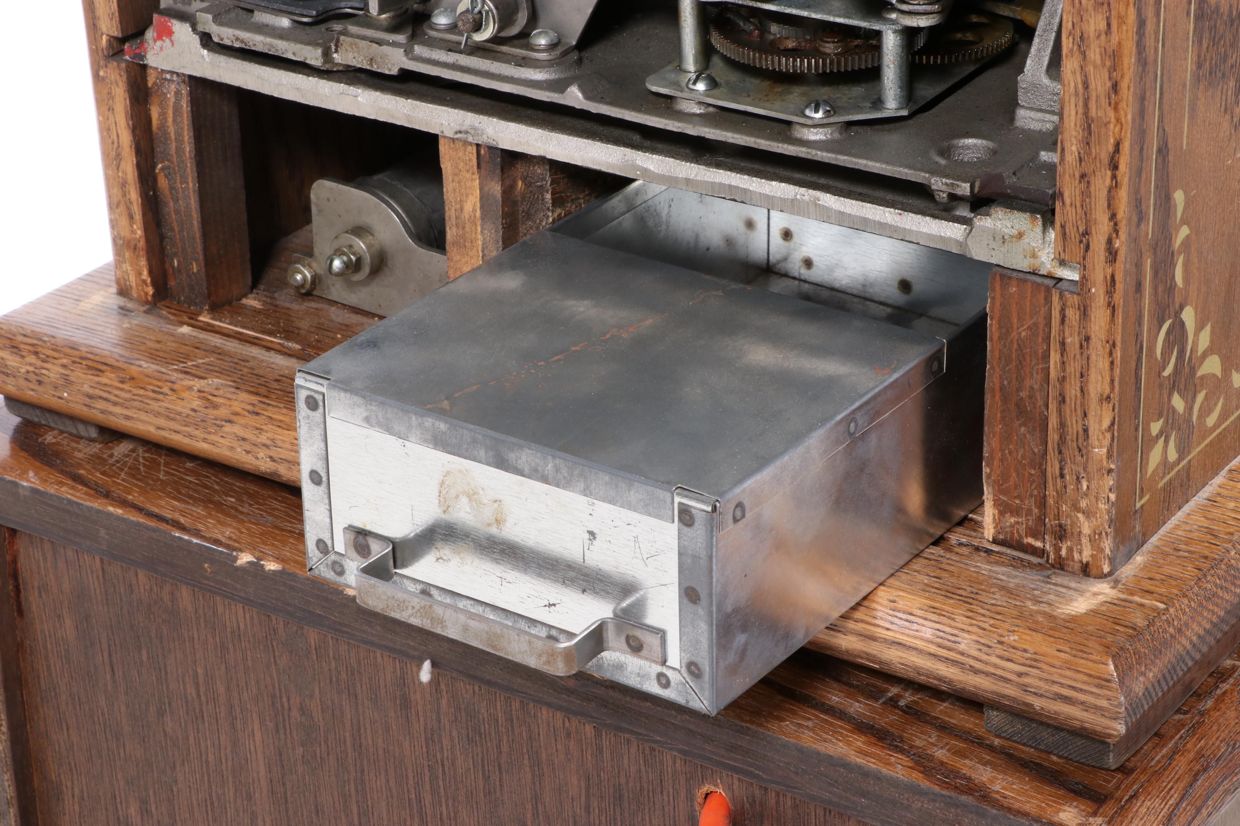 Mills "Golden Nugget" 25 Cent Coin-Operated Slot Machine and Cabinet, Mid-20th C