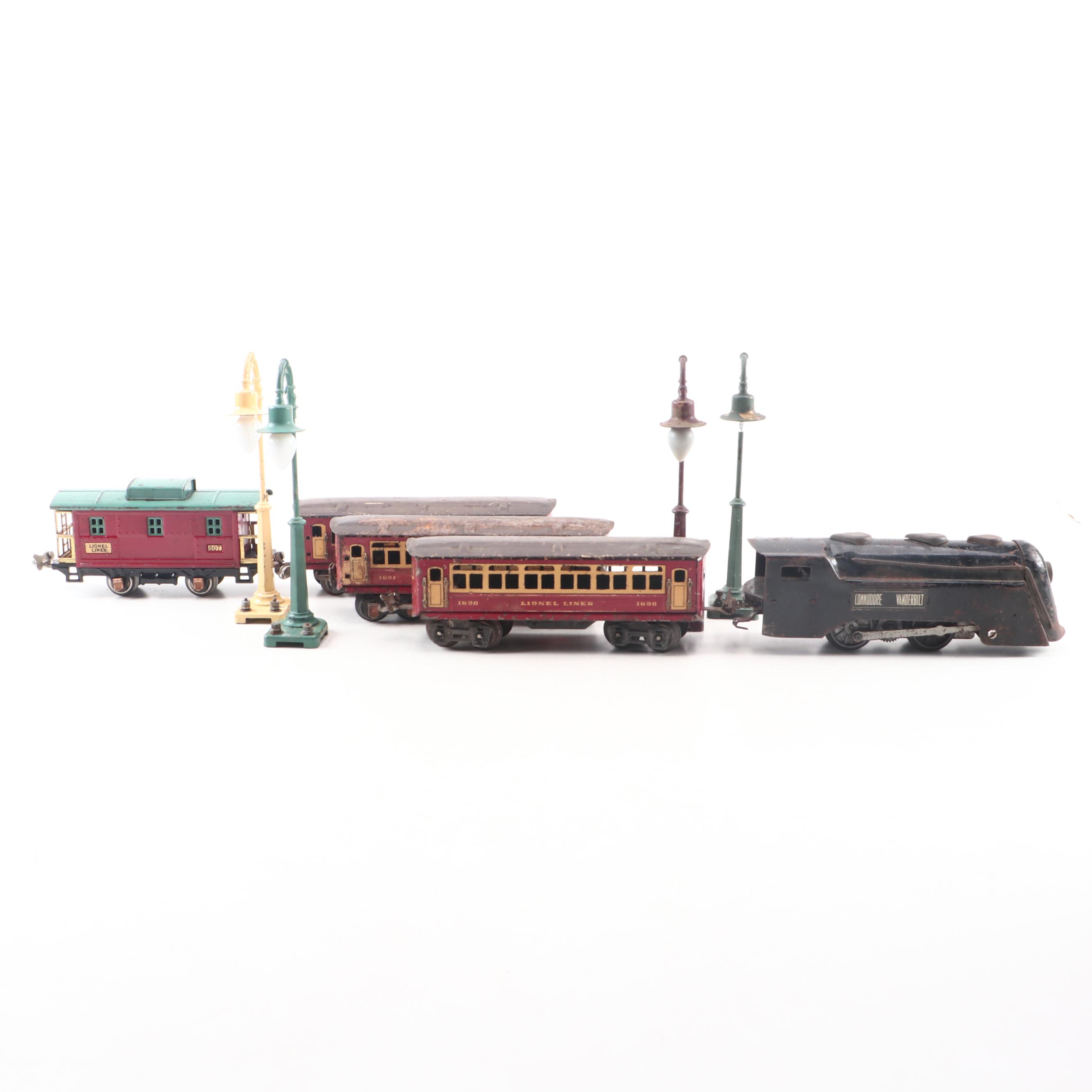 Lionel Passenger and Caboose Cars, "Commodore Vanderbilt" Engine and Light Poles