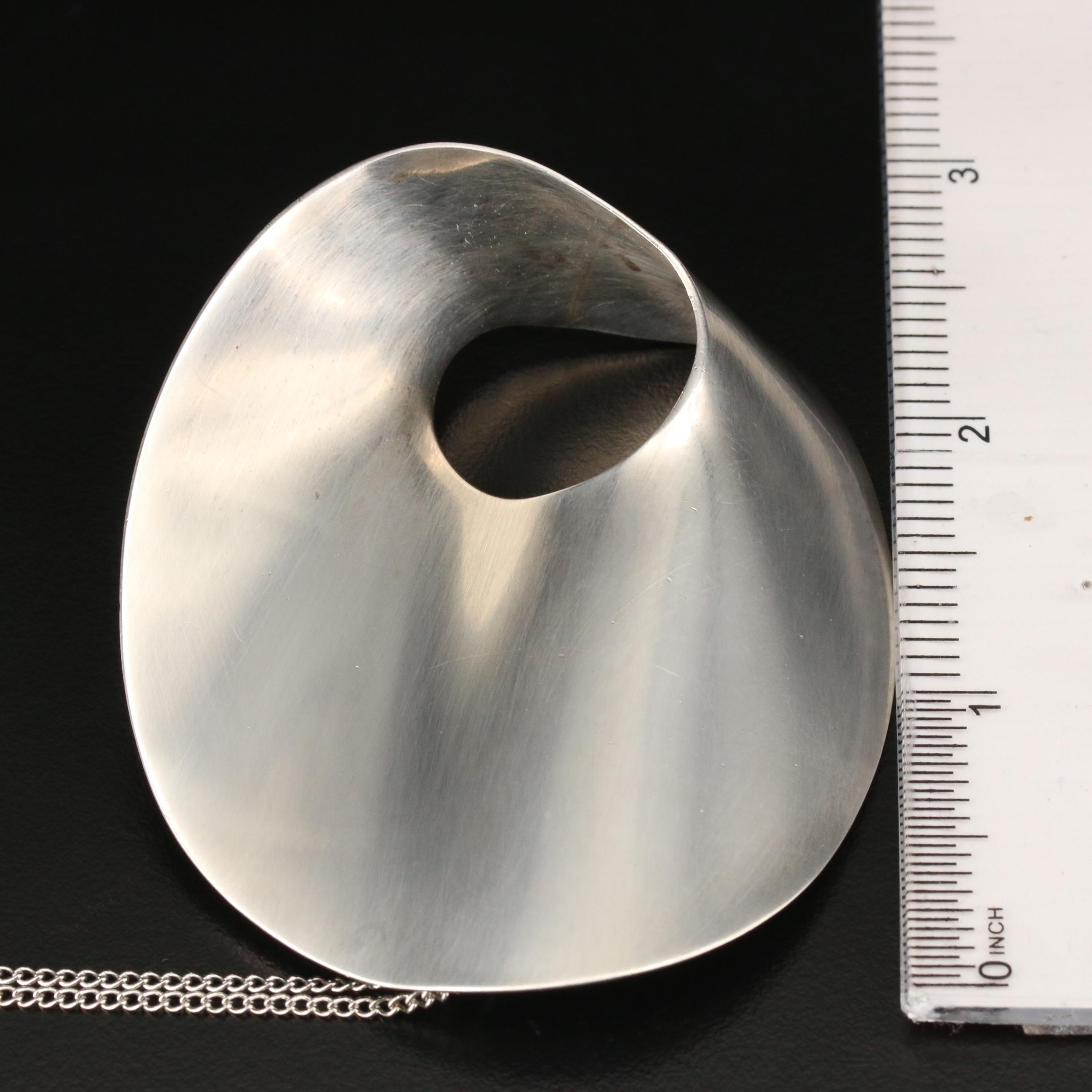 Modern Sterling Converter Pendant on Curb Chain