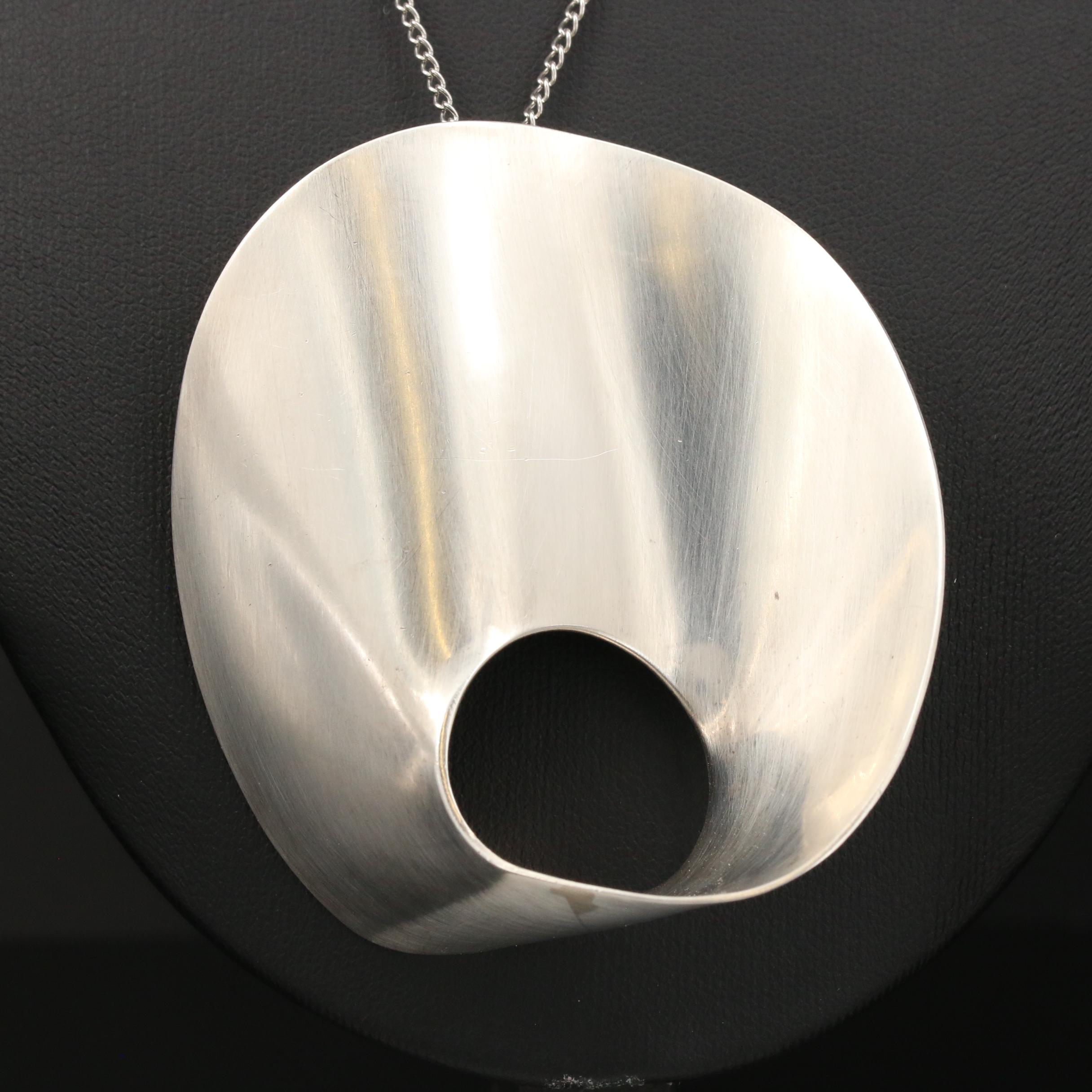 Modern Sterling Converter Pendant on Curb Chain