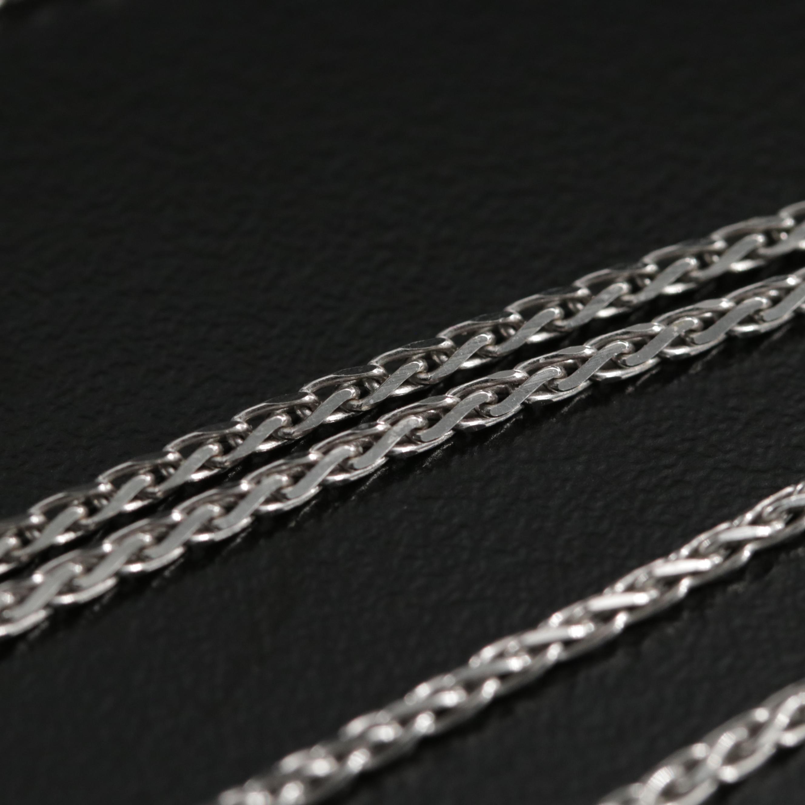 18K White Gold Diamond and Ruby Cross Pendant on 14K Braided Chain