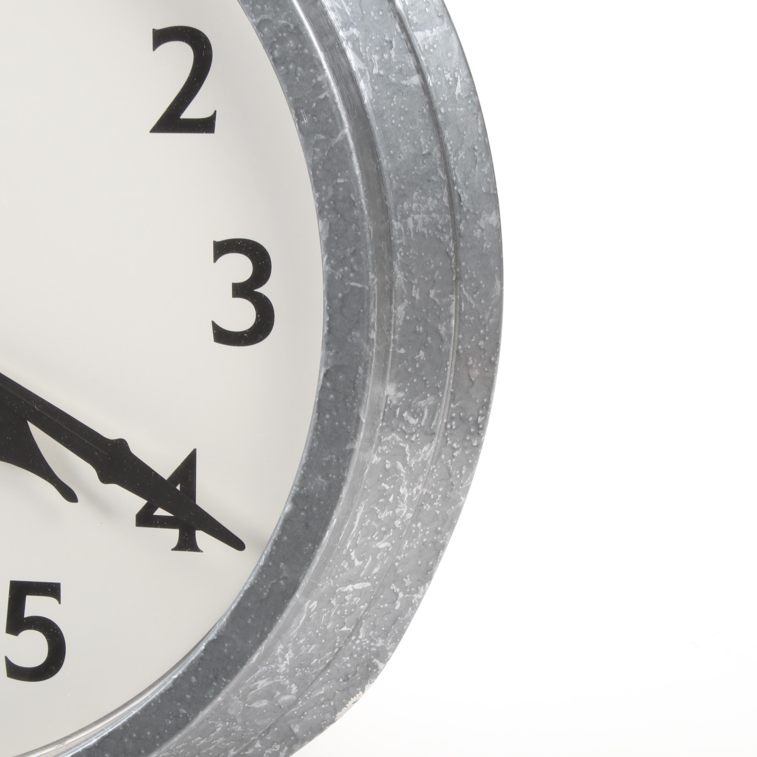 Baskerville Distressed Metal Wall Clock and Mediterranean-Style Candle Holders