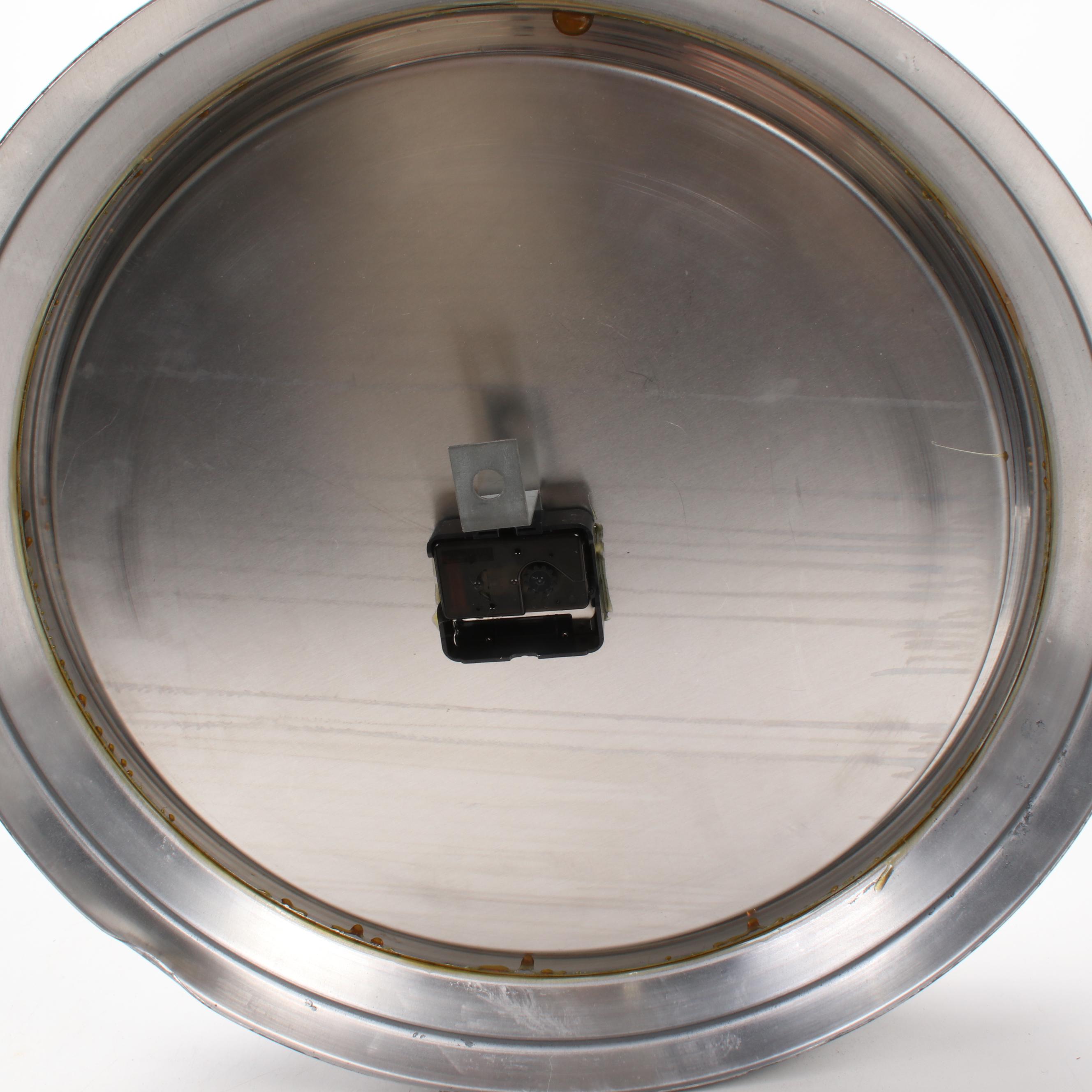 Baskerville Distressed Metal Wall Clock and Mediterranean-Style Candle Holders