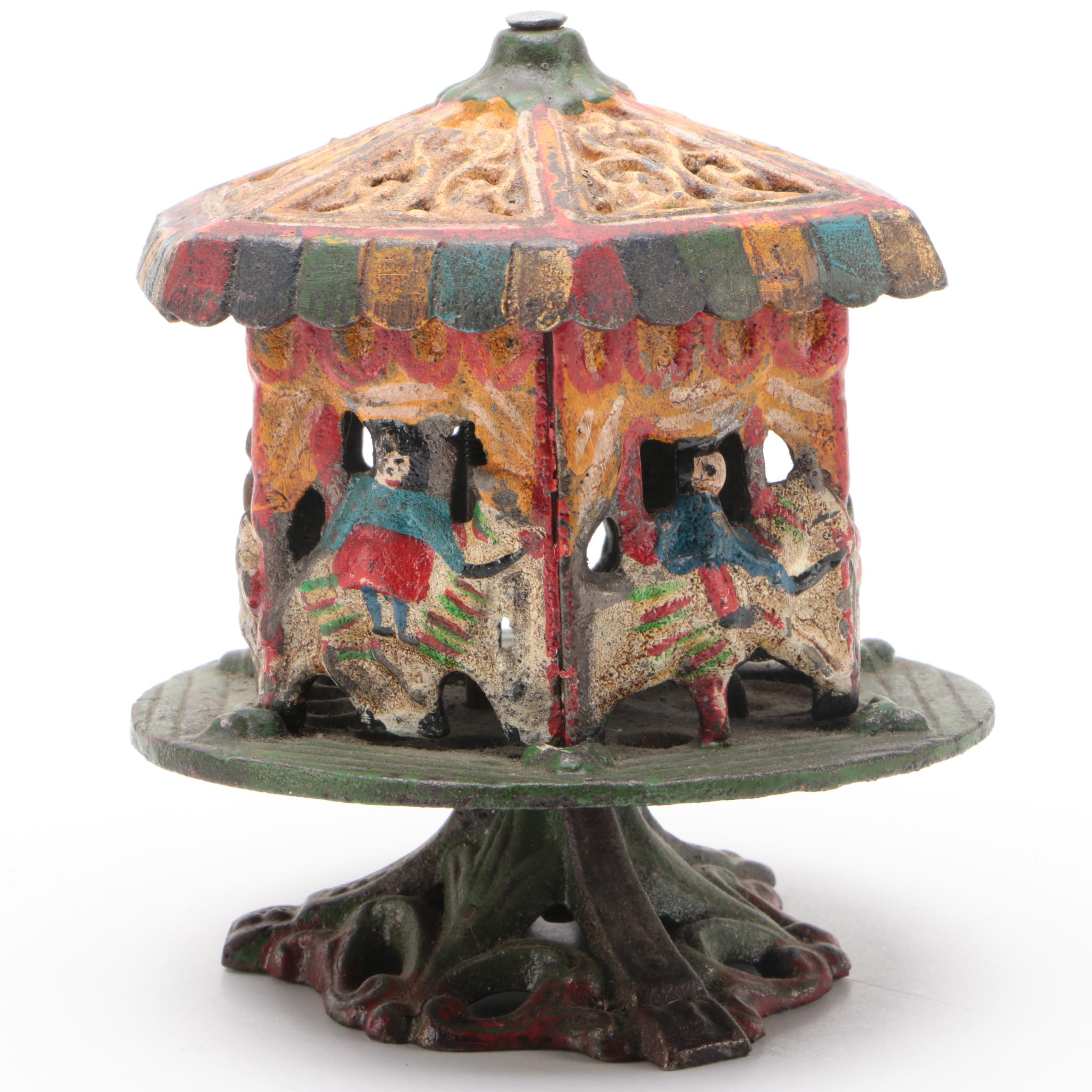 Carousel Merry-Go-Round Cast Iron Still Bank, 20th Century