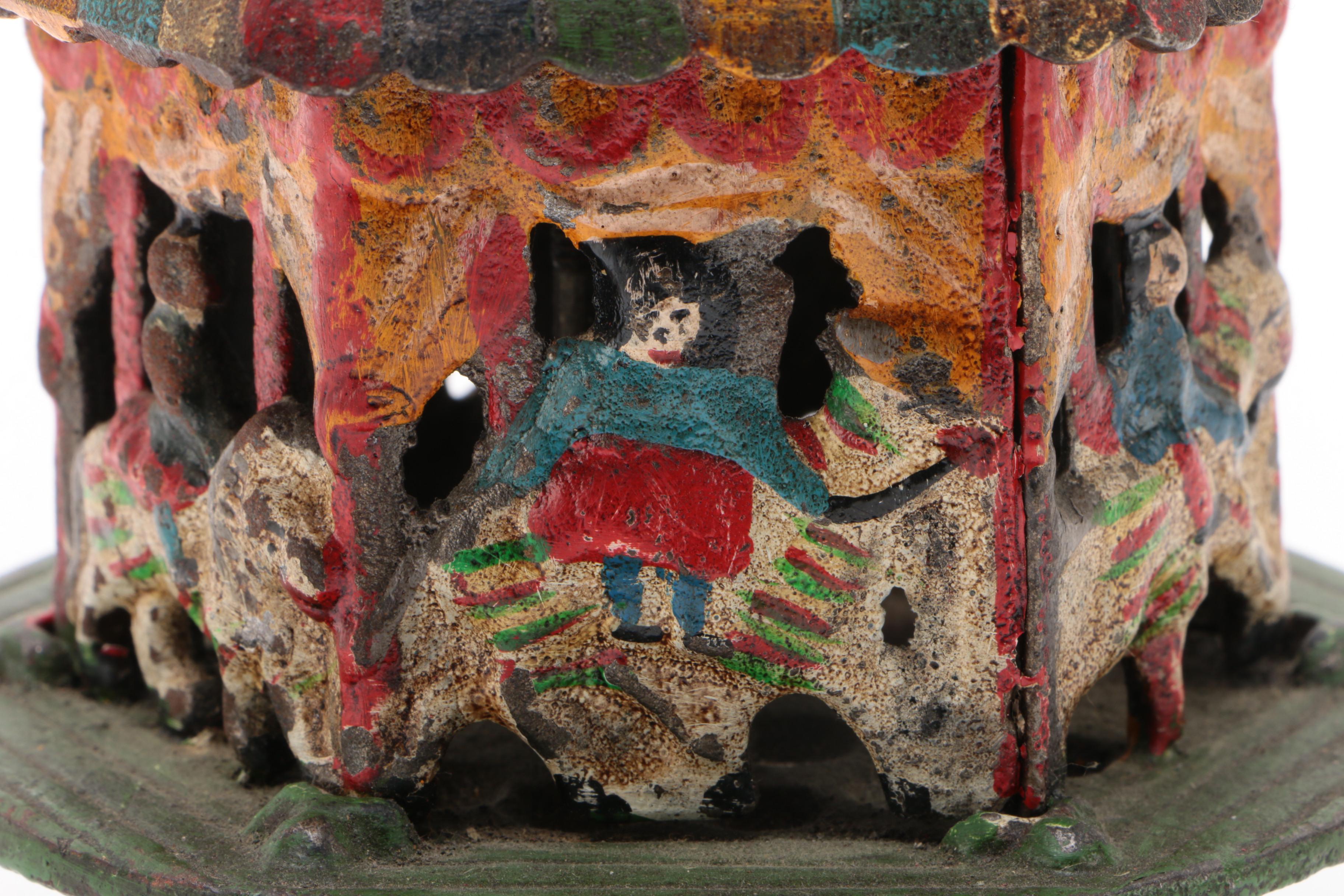 Carousel Merry-Go-Round Cast Iron Still Bank, 20th Century