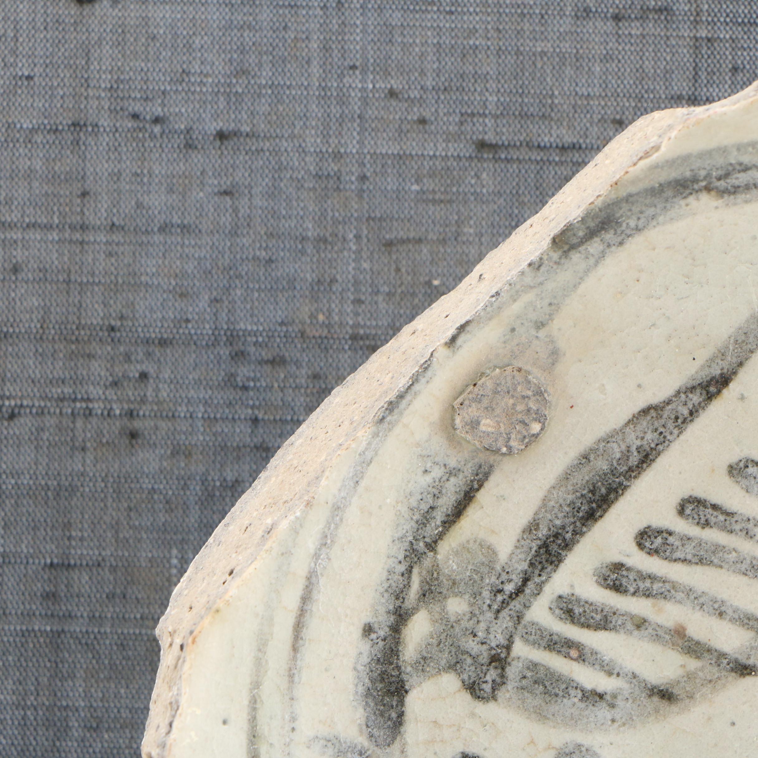 Thai Sawankhalok Ceramic Bowl Fragment with Fish Design, 14th/15th Century