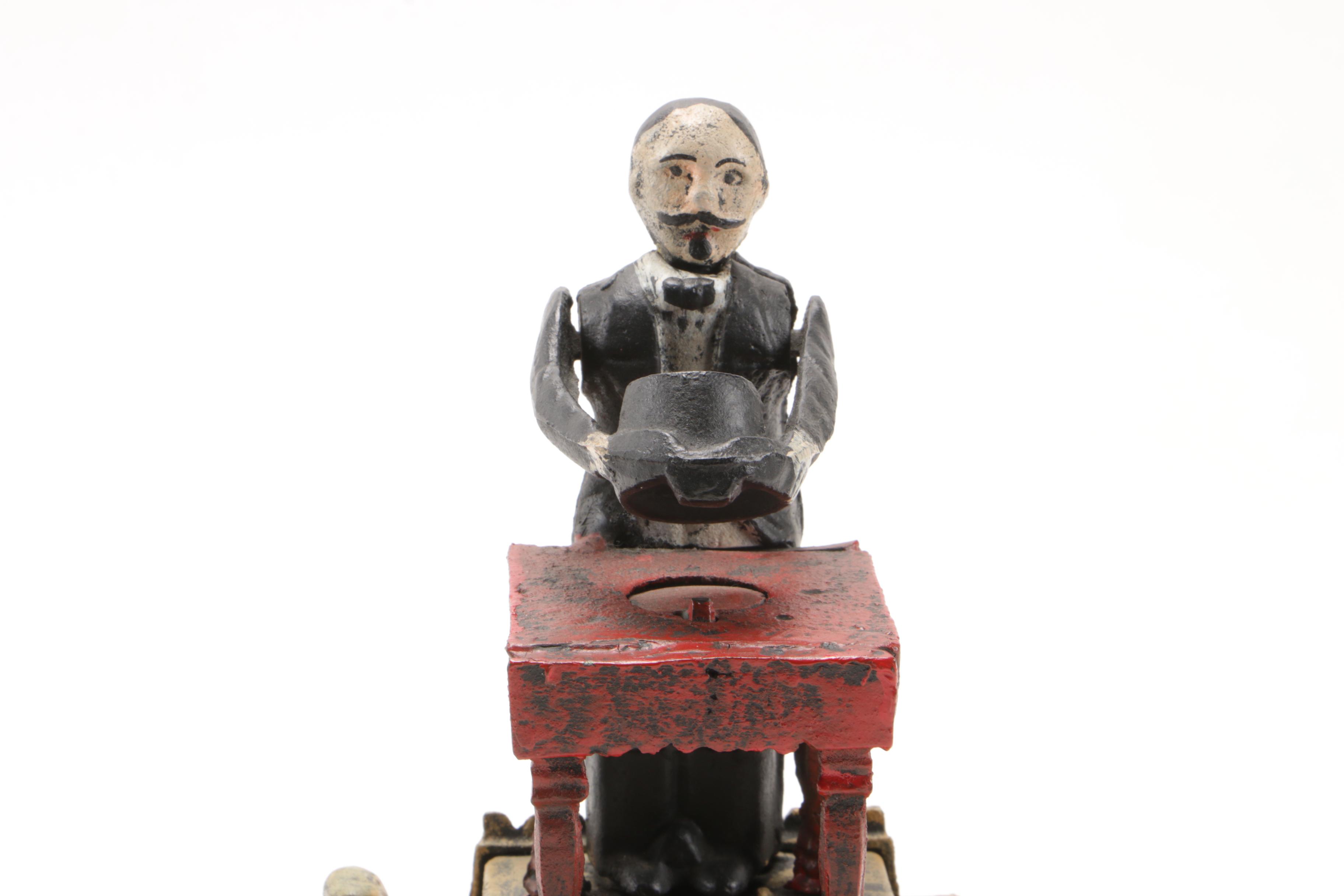 Magician with Hat Polychrome Painted Mechanical Cast Iron Bank