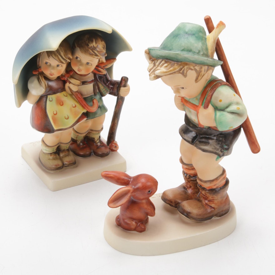 Goebel “Sensitive Hunter” and "Stormy Weather" Porcelain Hummel Figurines