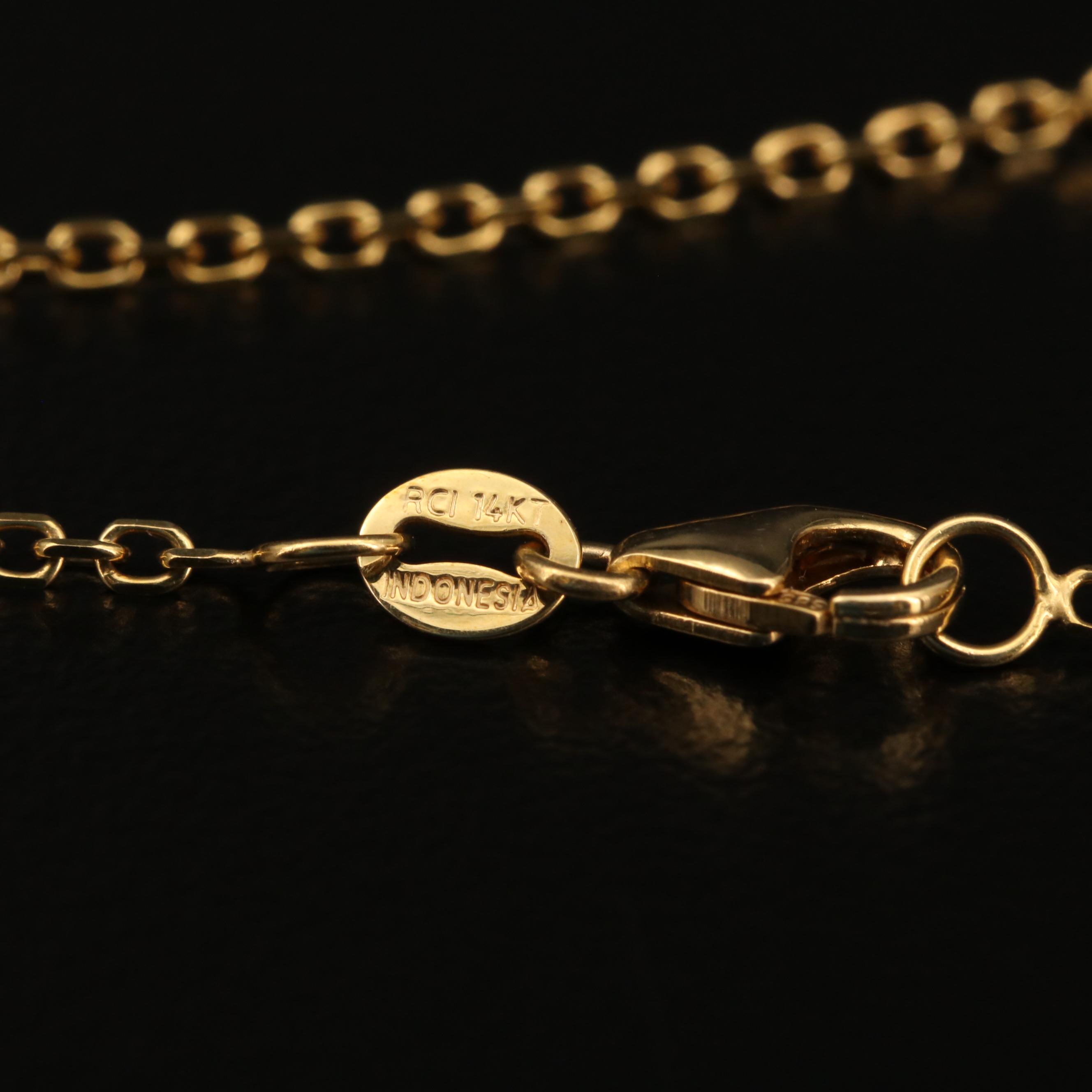 Vintage 14K and 18K Gold Ruby Bird Necklace with Glass Accents