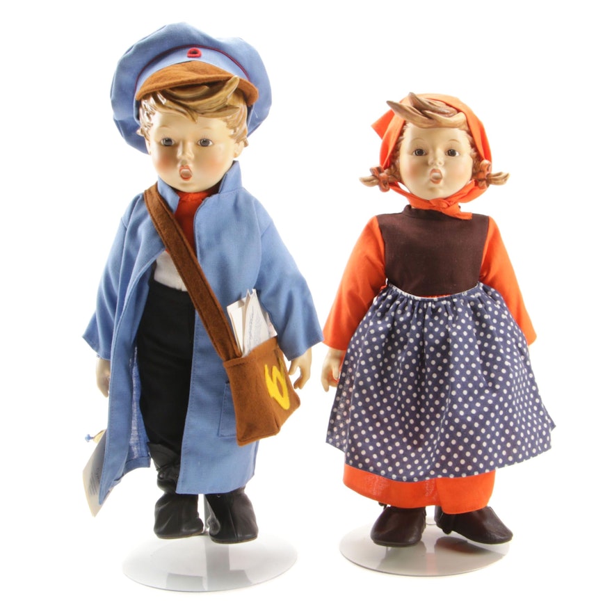 Hummel Postman and Schoolgirl Dolls on Stands, Late 20th Century