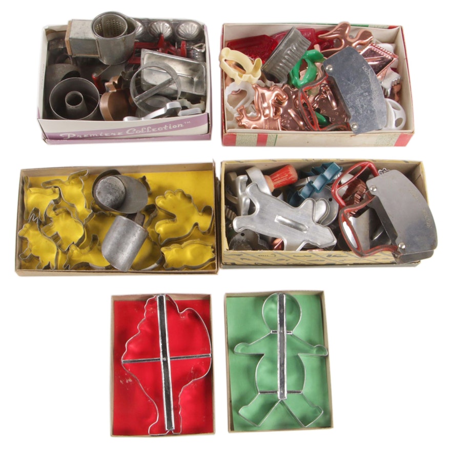 Bent Metal and Plastic Cookie Cutters with Other Bakeware