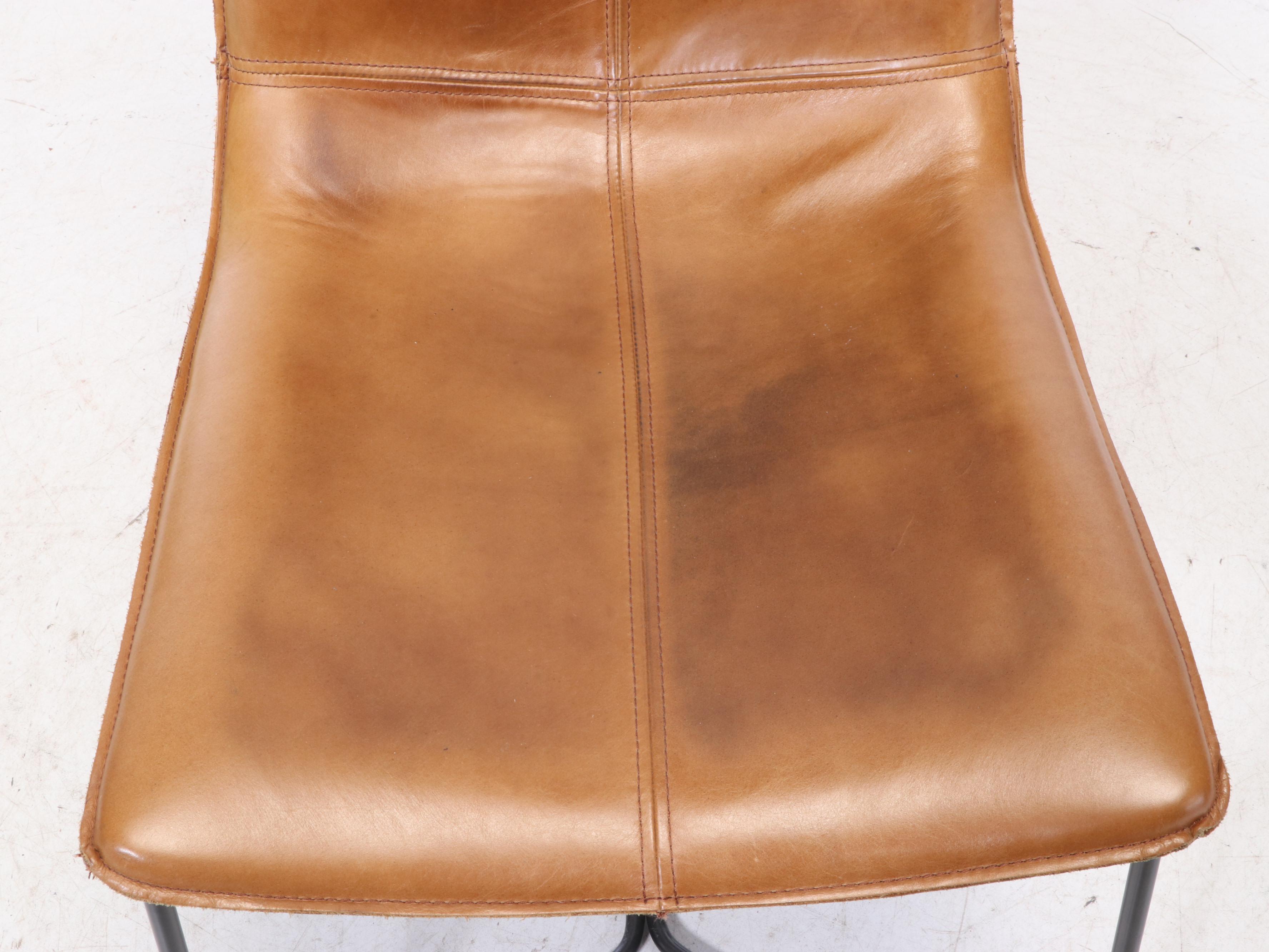 West Elm Slope Saddle Leather Dining Chair EBTH   1589282684958 Ca30c25ed51248a4058f7f5dd249c042084fc5a83d757f6da86707dd8e80a4fc.JPG