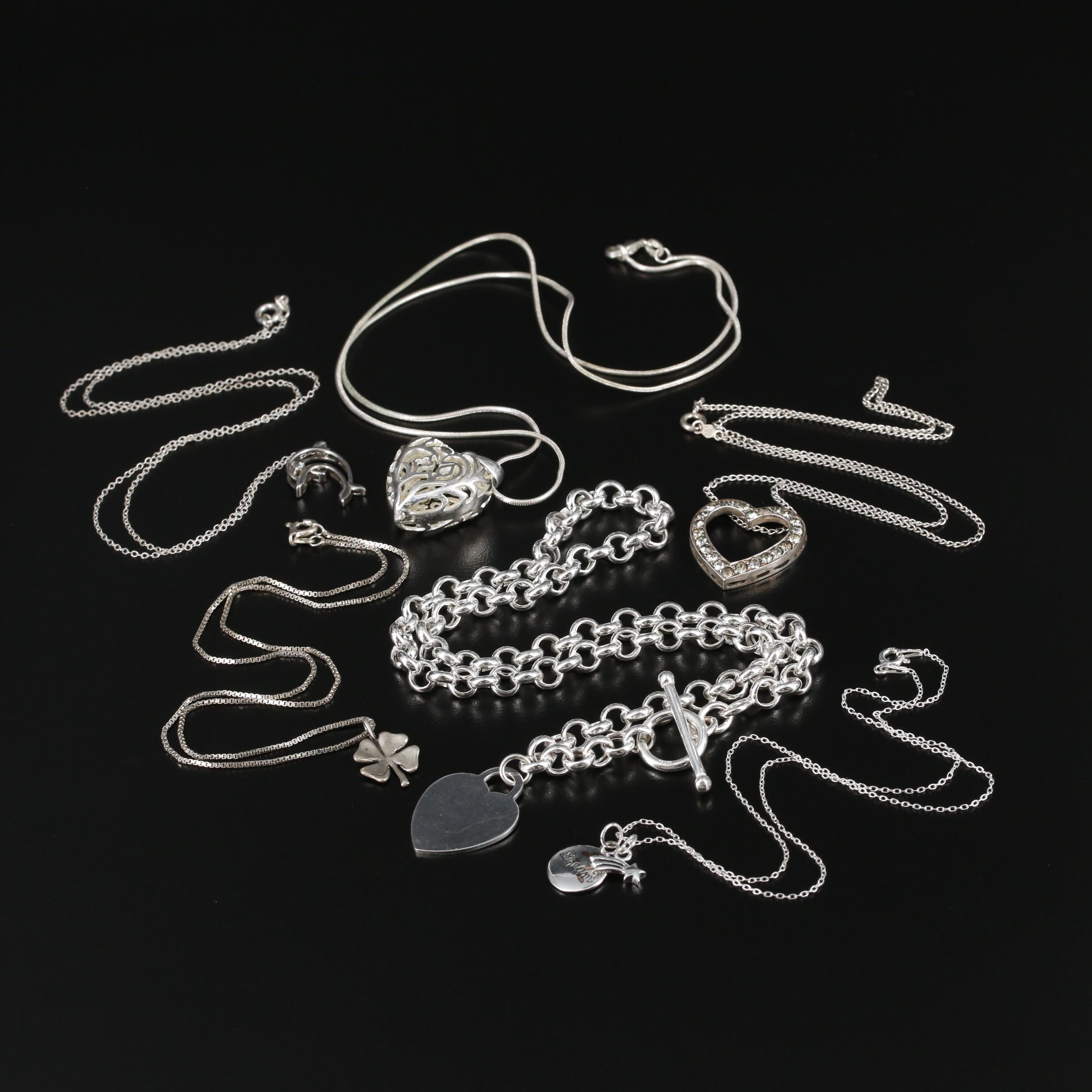 Collection of Sterling Necklaces with Dolphin and Four Leaf Clover Pendant