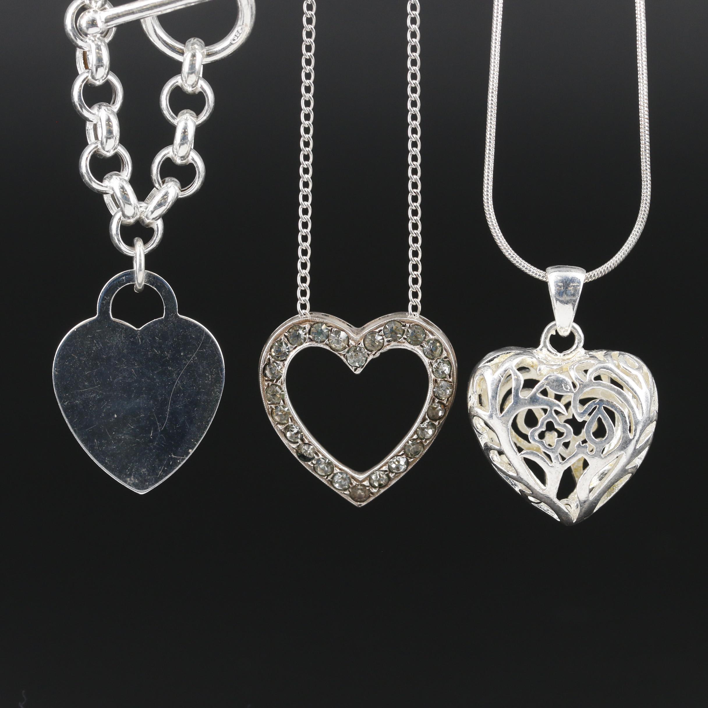 Collection of Sterling Necklaces with Dolphin and Four Leaf Clover Pendant