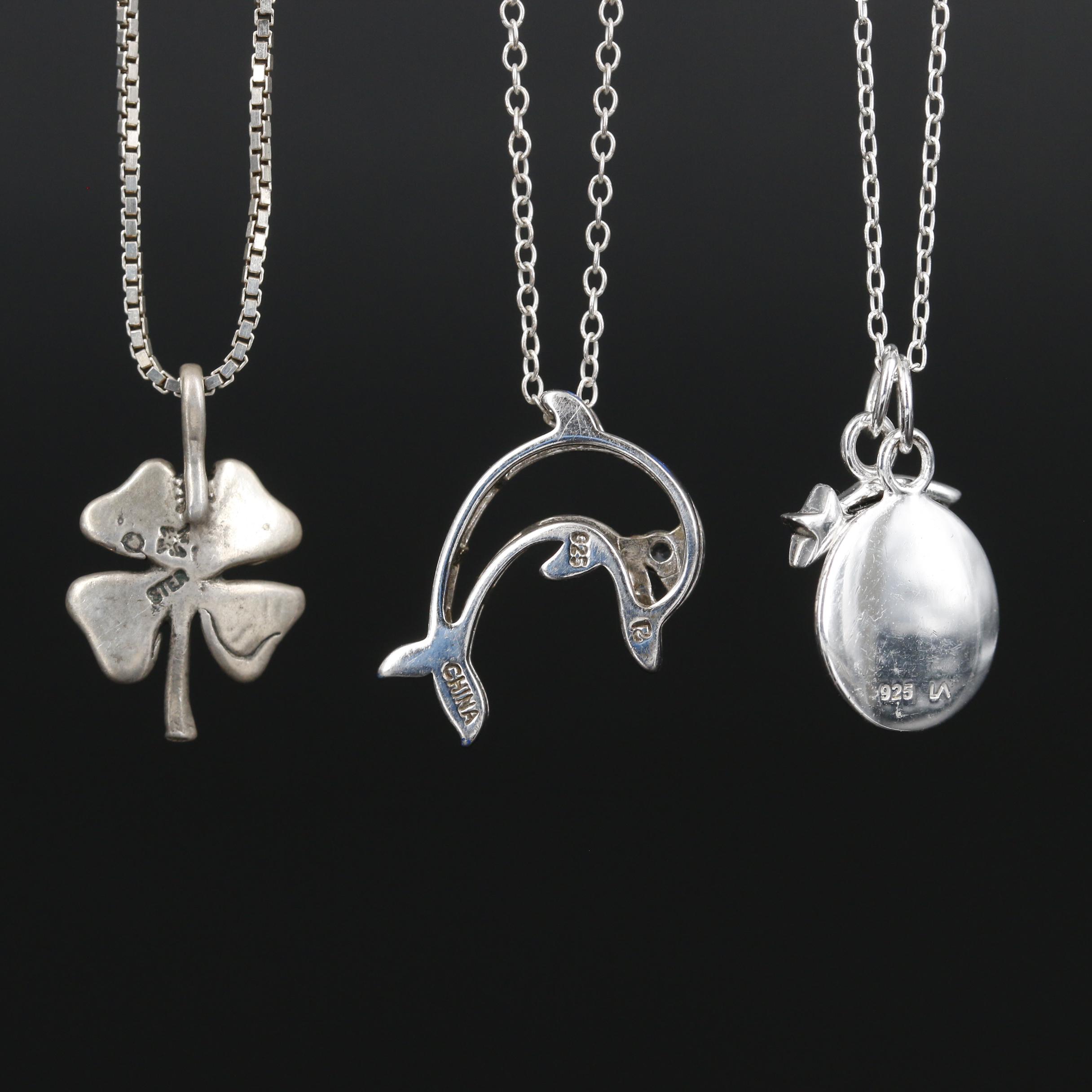 Collection of Sterling Necklaces with Dolphin and Four Leaf Clover Pendant