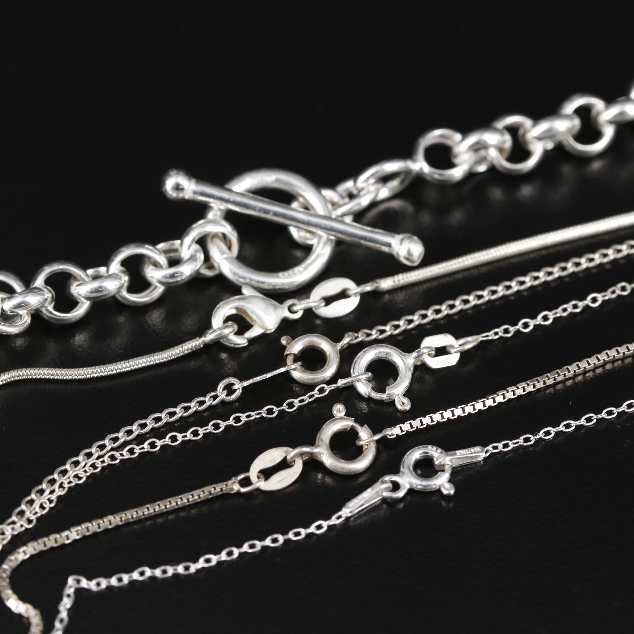 Collection of Sterling Necklaces with Dolphin and Four Leaf Clover Pendant