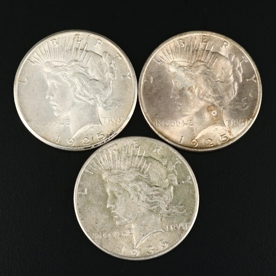 Three Peace Silver Dollars
