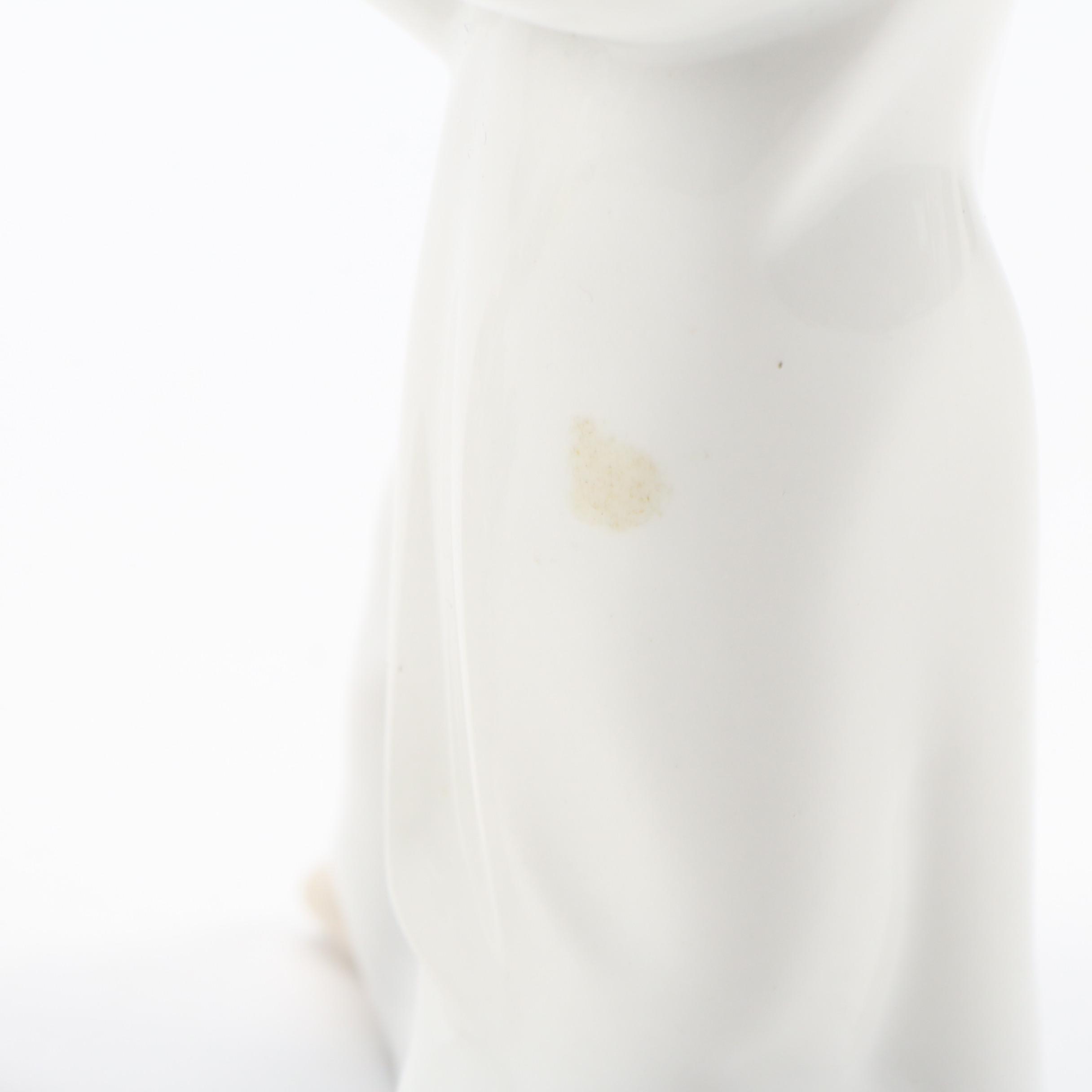 Lladró "Angel with Flute" and "Angel Laying Down" Porcelain Figurines