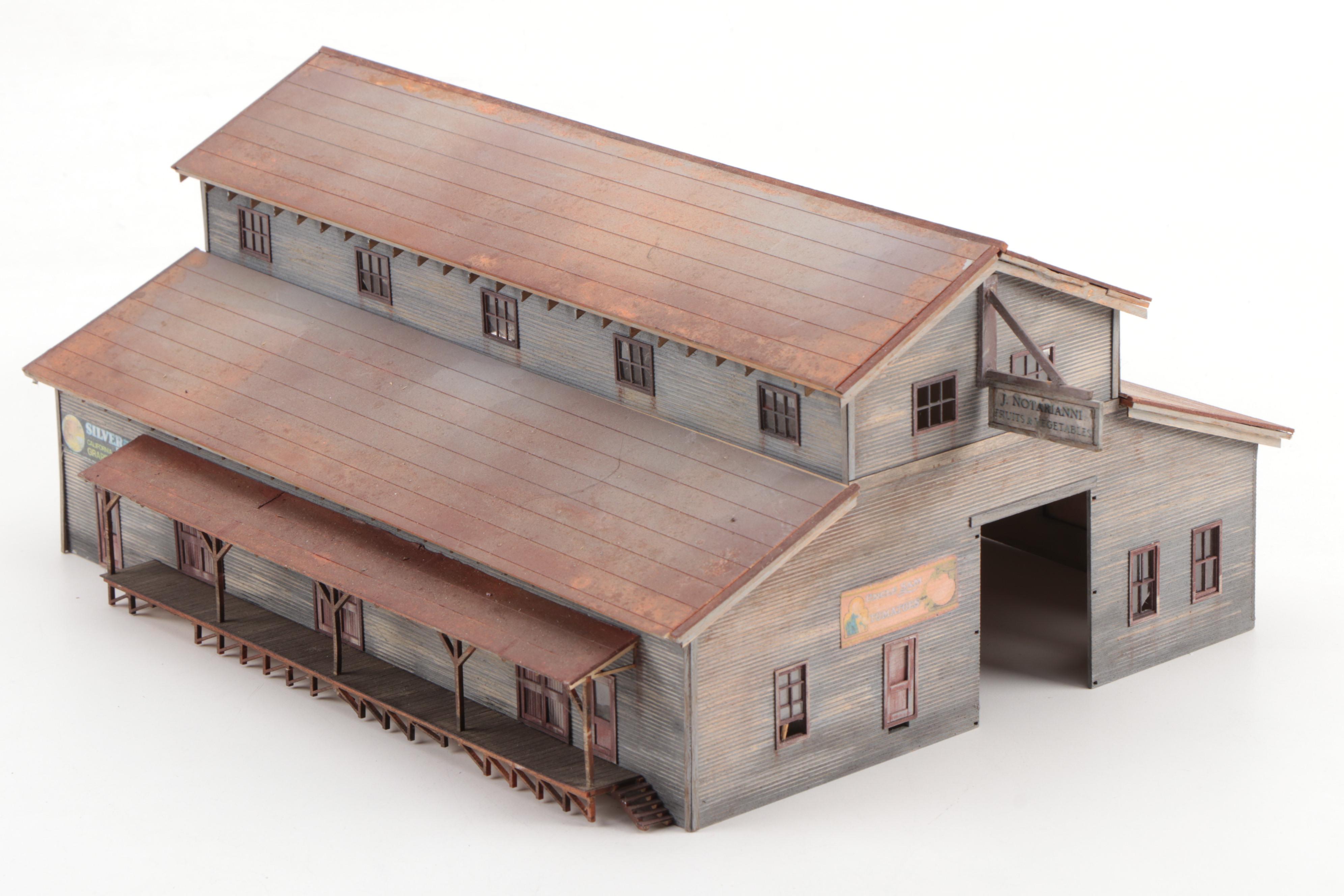 Model Train Structures Including Shops, Houses and a Church