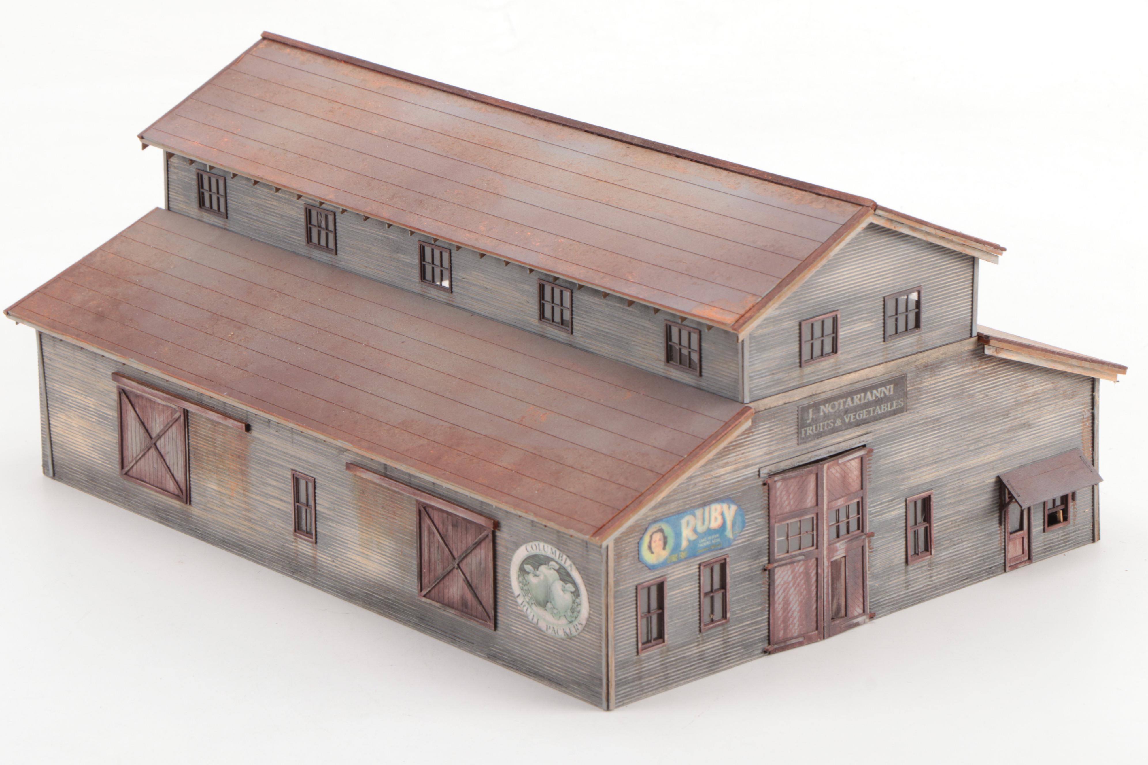 Model Train Structures Including Shops, Houses and a Church