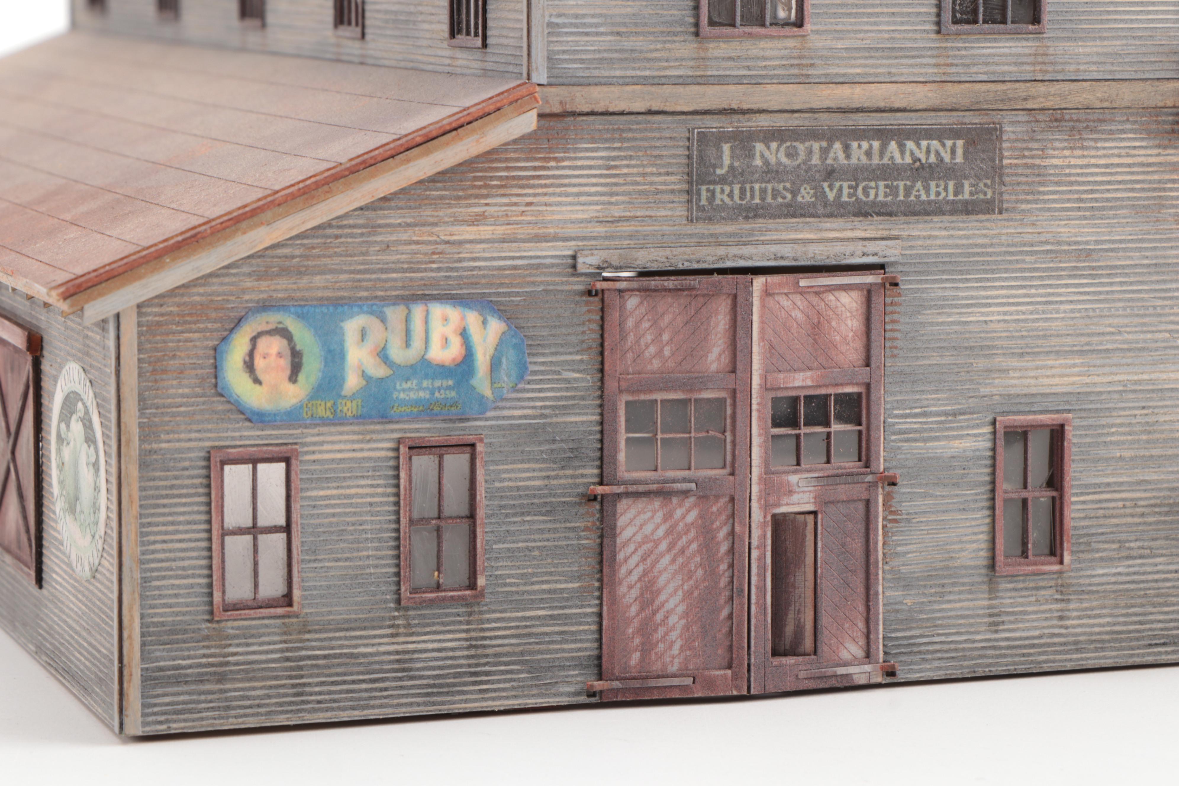 Model Train Structures Including Shops, Houses and a Church