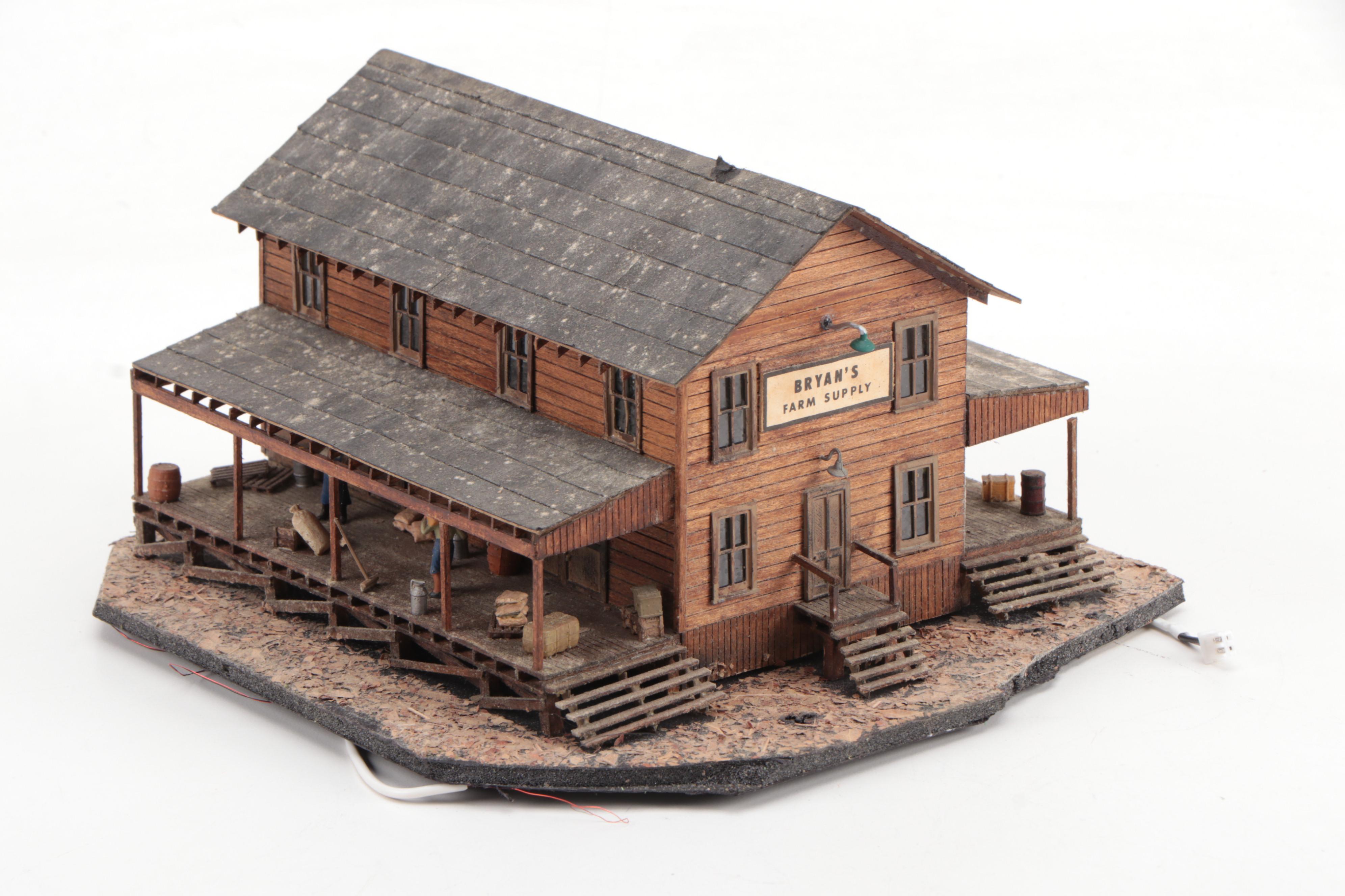 Model Train Structures Including Shops, Houses and a Church