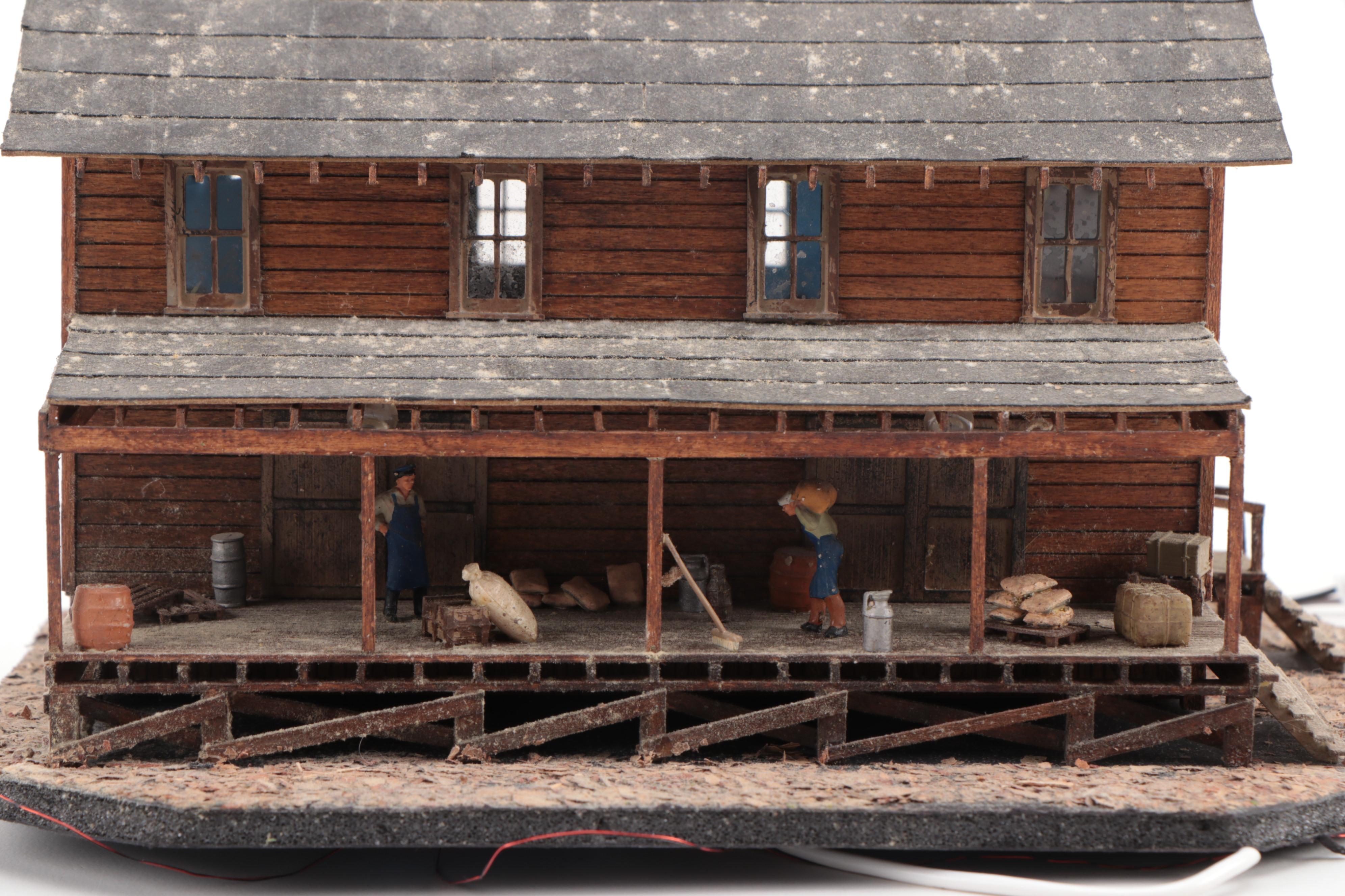 Model Train Structures Including Shops, Houses and a Church