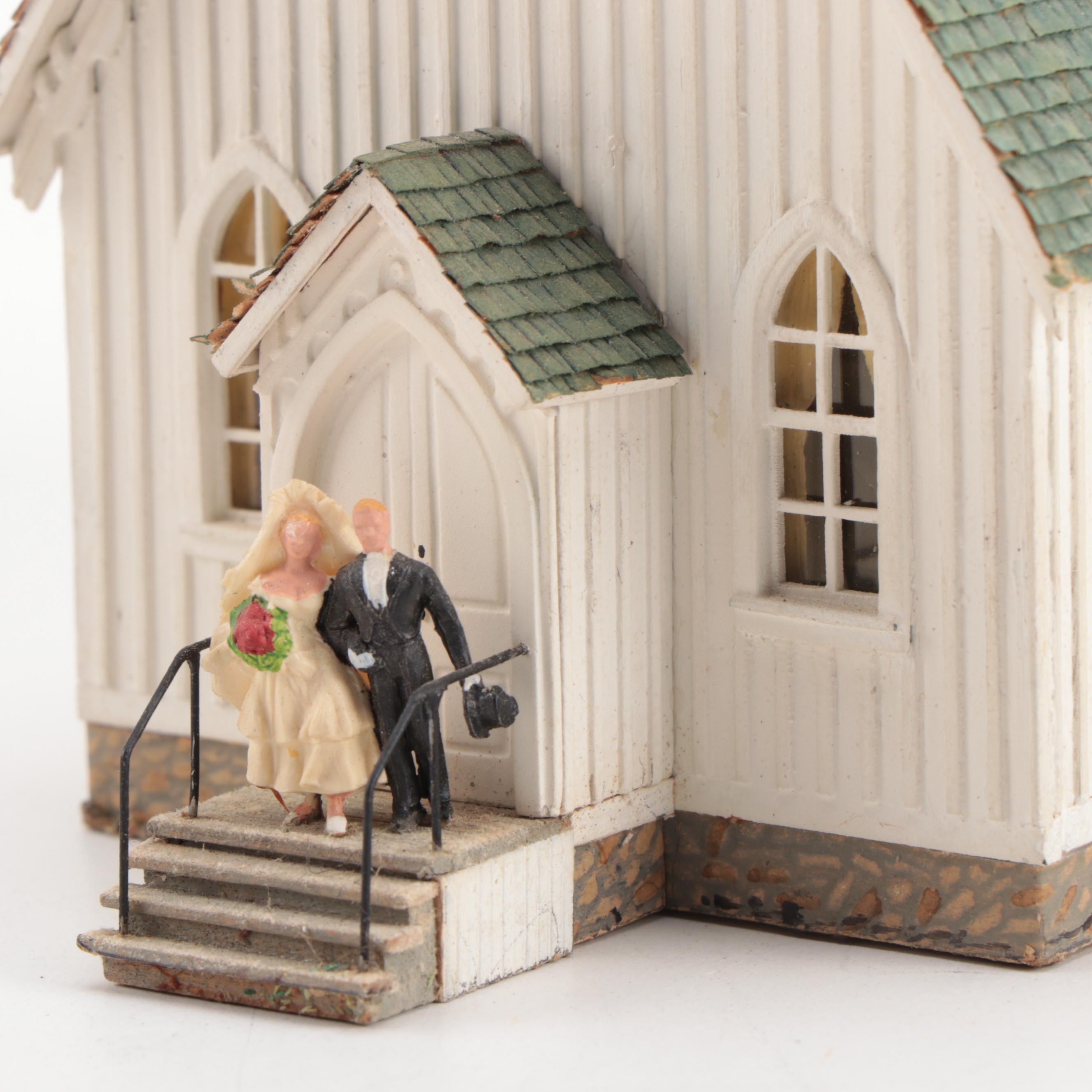 Model Train Structures Including Shops, Houses and a Church