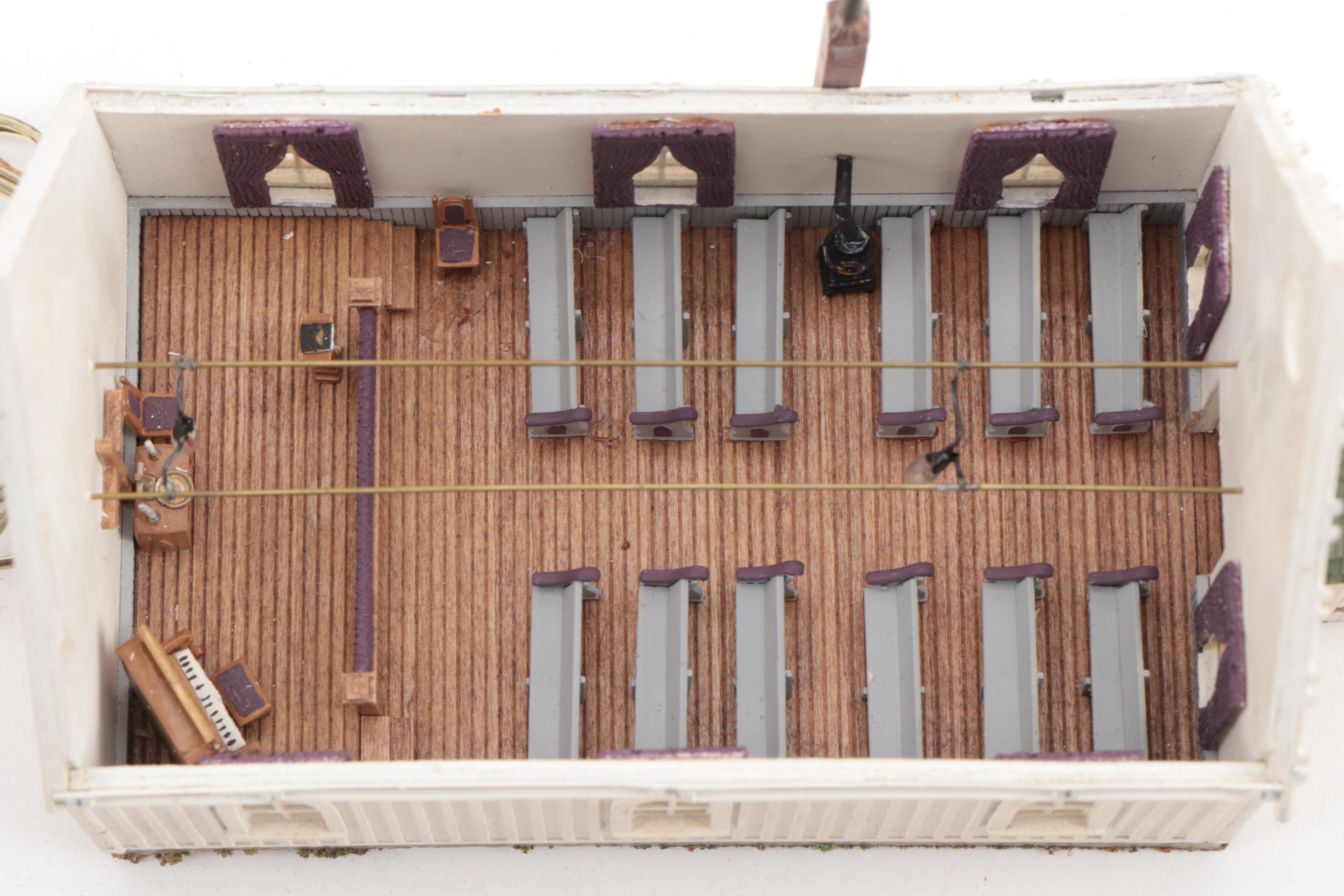 Model Train Structures Including Shops, Houses and a Church